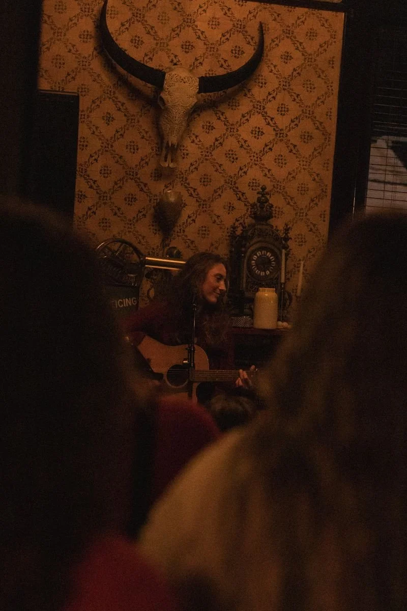 me in the middle of heads.jpeg