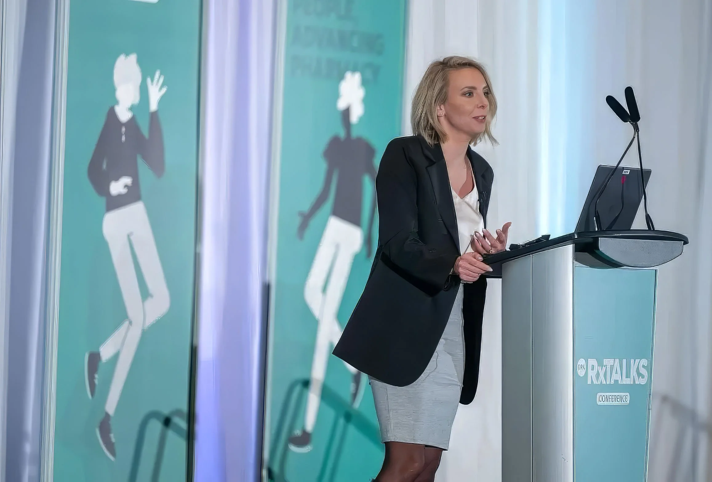 Kristen Watt speaking at a conference
