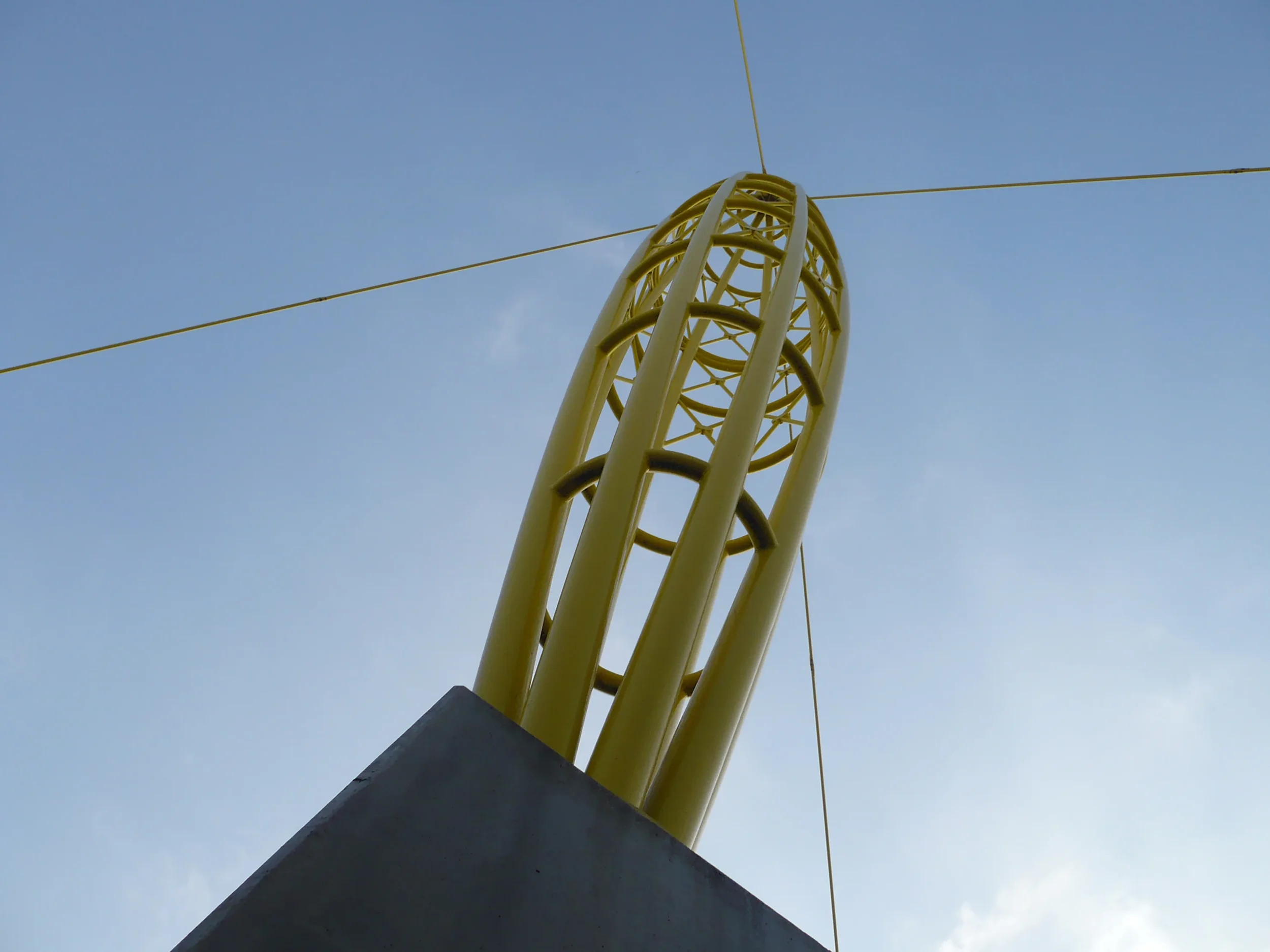 igus Headquarters — Yellow Lattice Pylon Tip Detail, Cologne