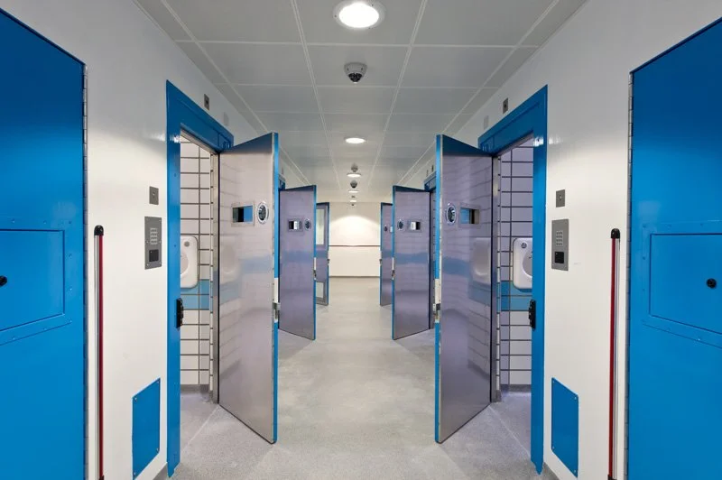 Metropolitan Police, Wandsworth – custody suite corridor with cell doors