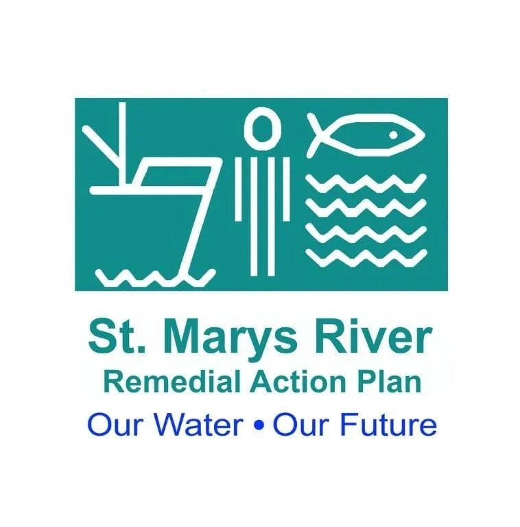 Logo for the St. Marys River Remedial Action Plan, featuring stylized images of a boat, a person, a fish, and water waves, with the text "St. Marys River Remedial Action Plan Our Water Our Future."