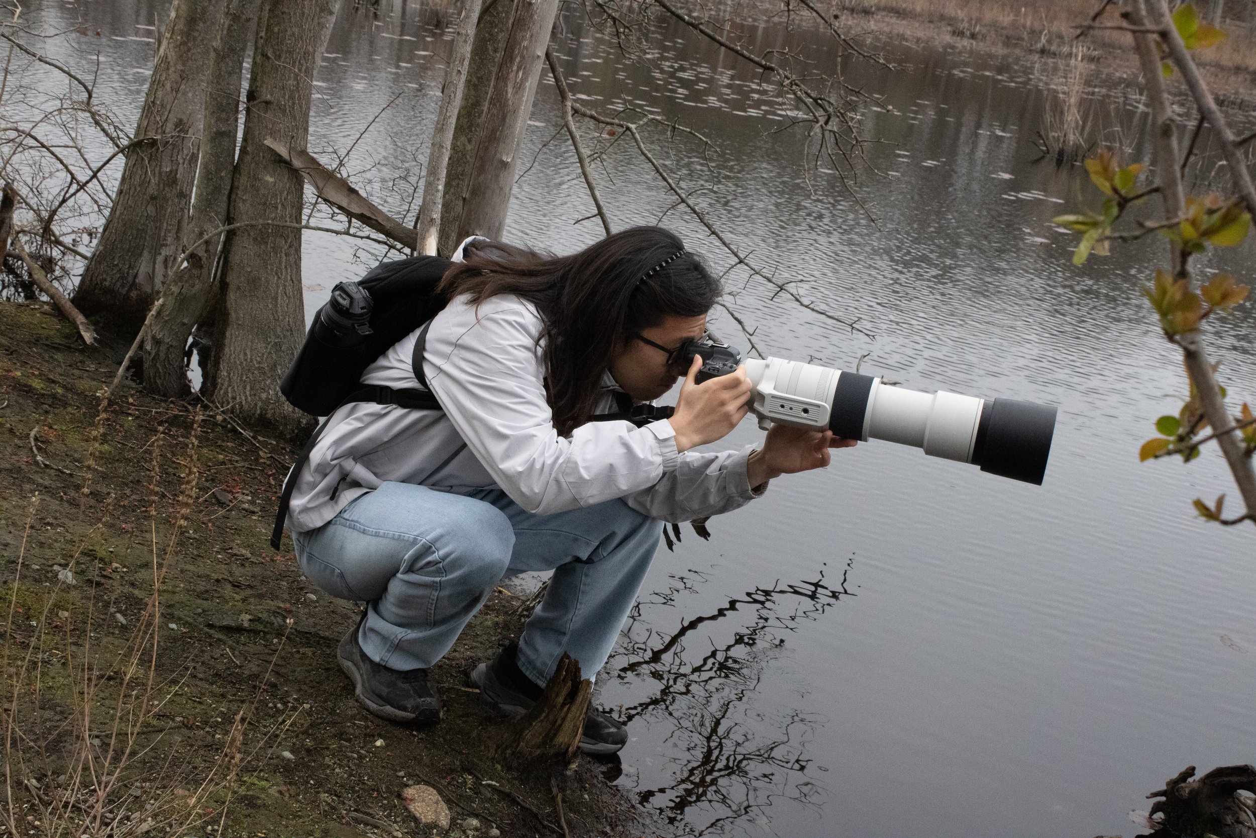 McQueen Chen, 19, an international film student at Boston University, taking his bird photography very seriously.