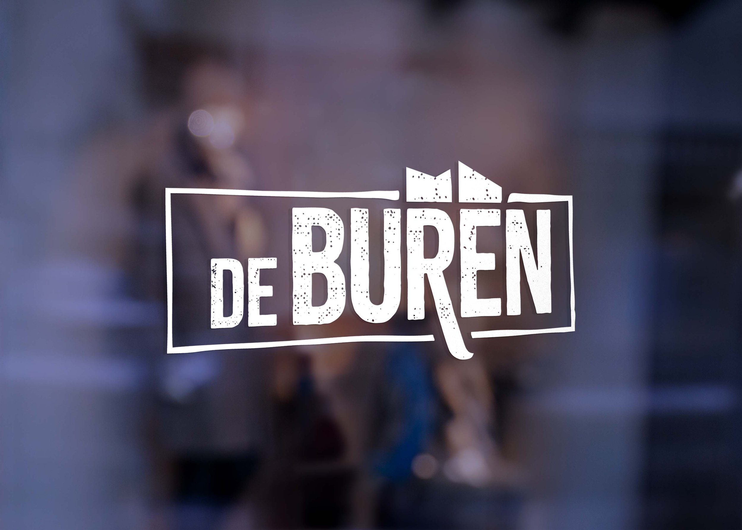 Het logo van De Buren. De strakke simplistische stijl van de eigenaren en het iconische dak van het pand waren de inspiratiebronnen voor het nieuwe logo.