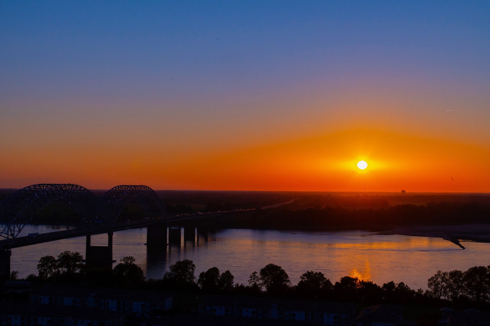 Winding Mississippi River Shimmers at Sunset