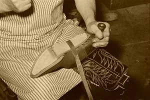 image of person making boots