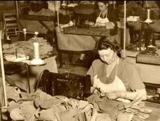 image of woman making ball glove