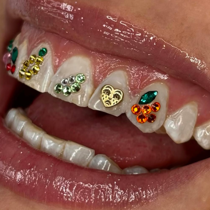 18k gold crying heart tooth gem. safe lead-free crystal tooth gems