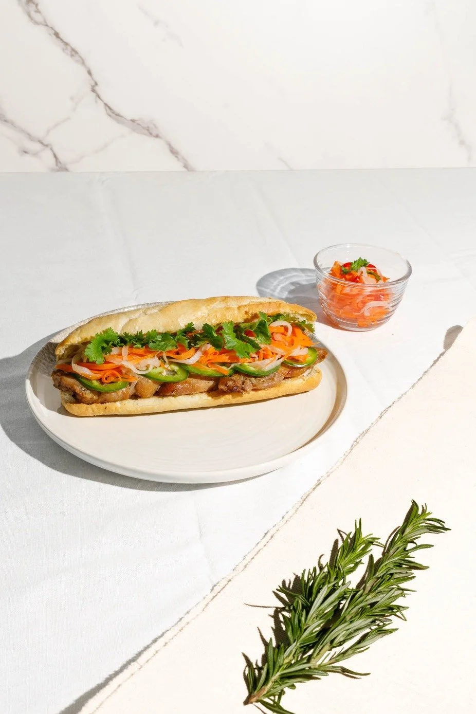 Enjoy a fresh Vietnamese sandwich loaded with vibrant ingredients perfect for a quick delight. 🌿 #BanhBo #NewarkEats #VietnameseCuisine #BanhMiMagic #QuickBite