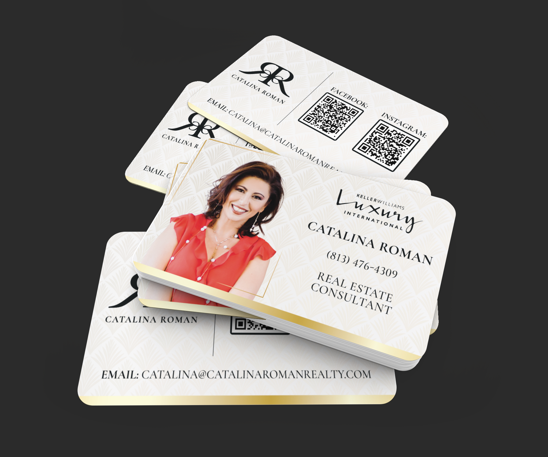 Stack of modern business cards for Catalina Roman, a real estate consultant, featuring her portrait, contact information, and QR codes for Facebook and Instagram.