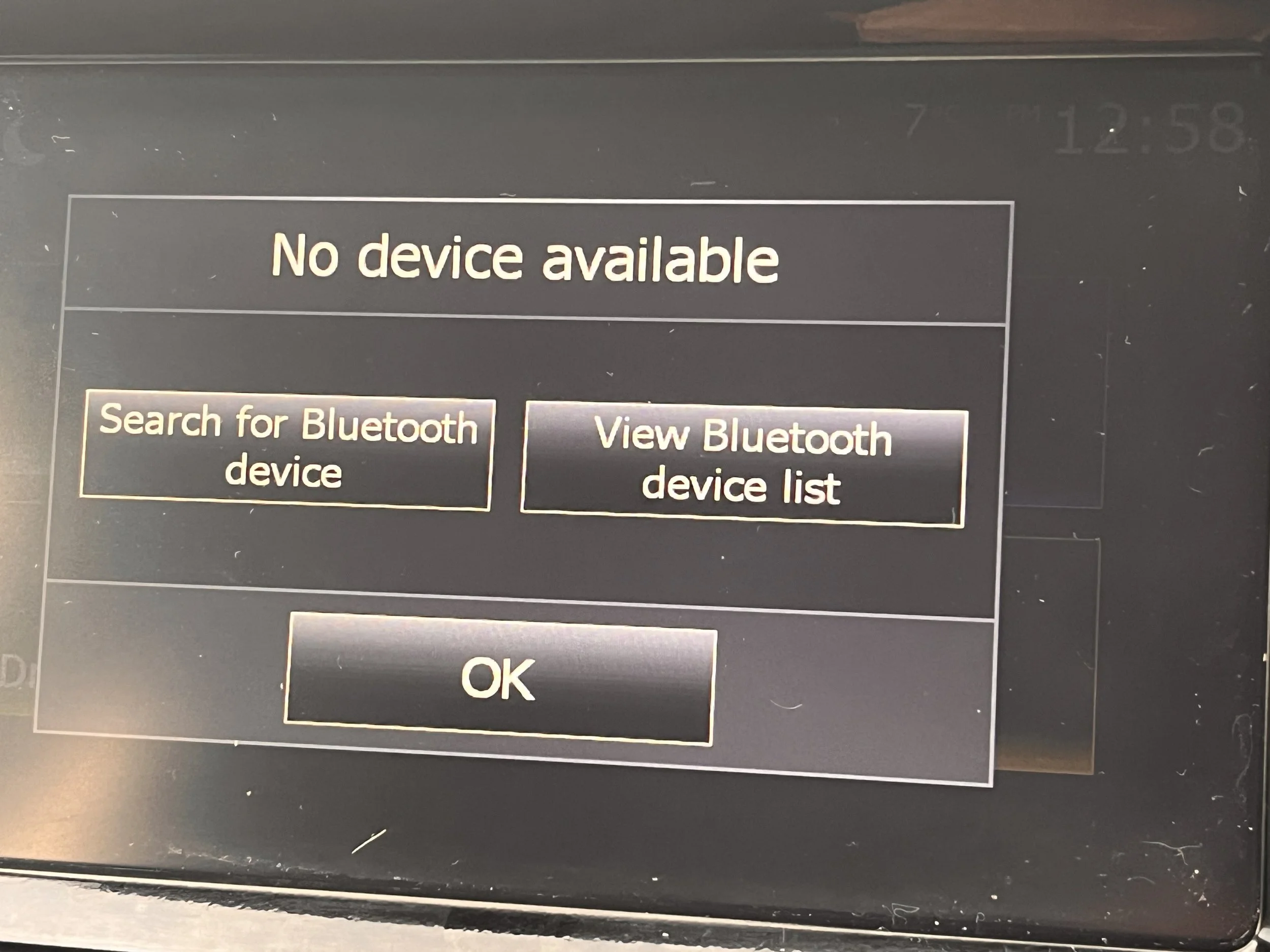 Screen showing message 'No device available' with options to search for Bluetooth device, view Bluetooth device list, and an OK button.