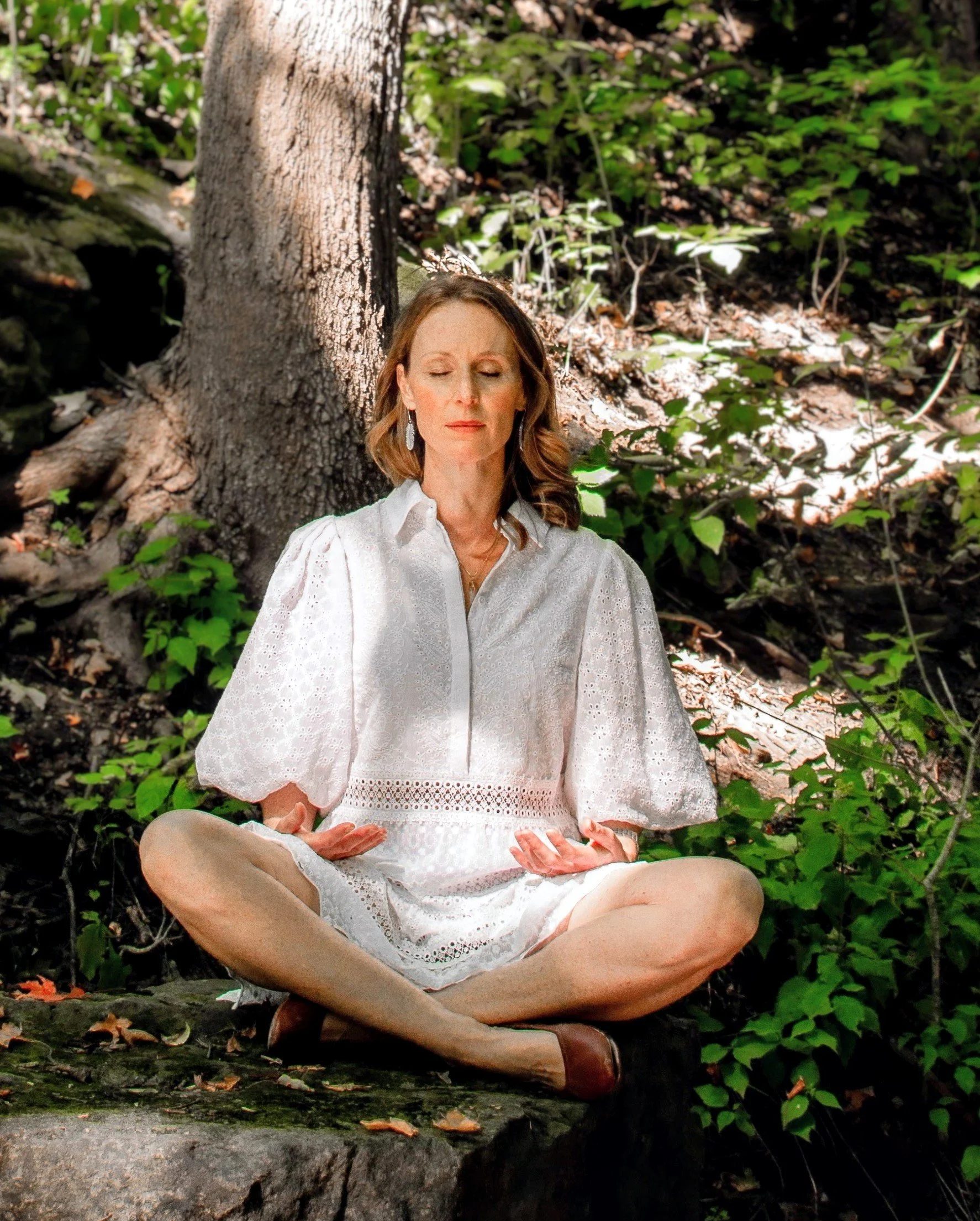 Jennifer Peace-Hall practicing mindfulness and nervous system regulation in nature, reflecting the holistic healing philosophy of HAOMA CO. Holistic Health.