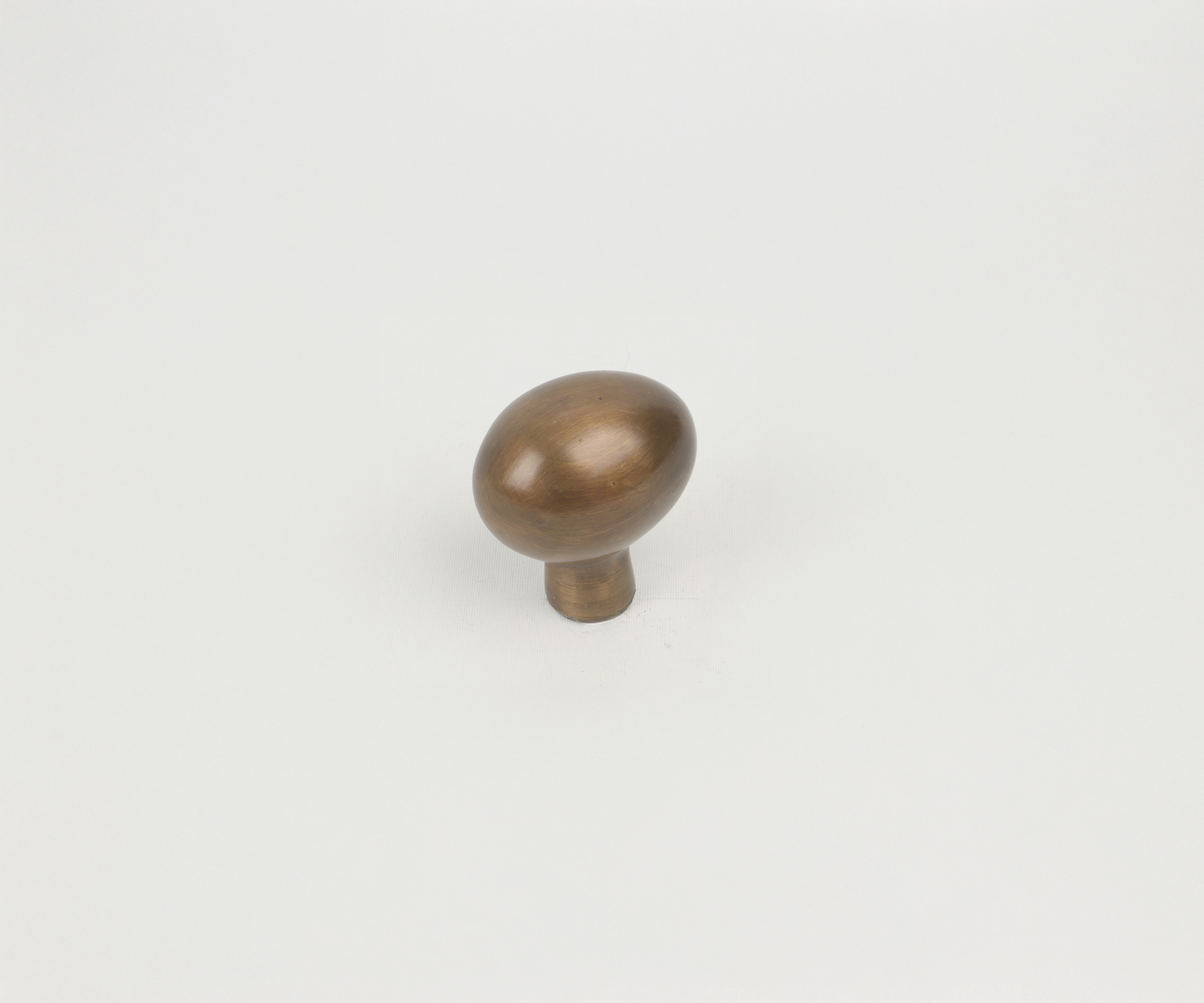 Wooden sculpture of a mushroom on a plain white background.