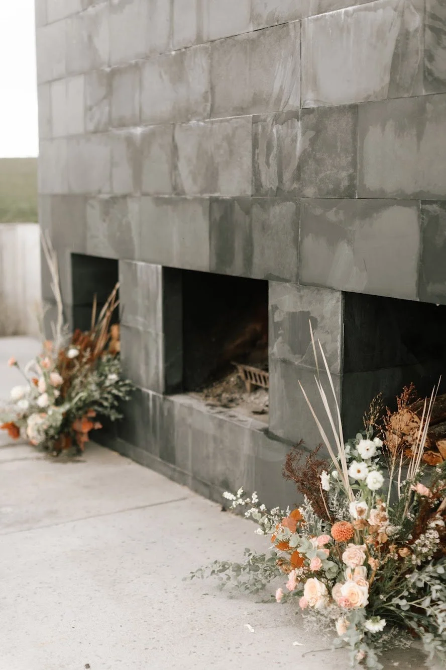Fireplace floral installation. Photo by Linnea Marie Photography