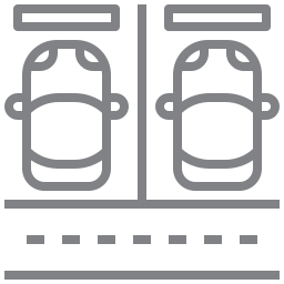 Outline of two cars parked in adjacent parking spaces with a dashed line and parking space markings.