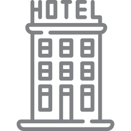 Line drawing of a multi-story hotel building with four rows of windows and a flat roof.