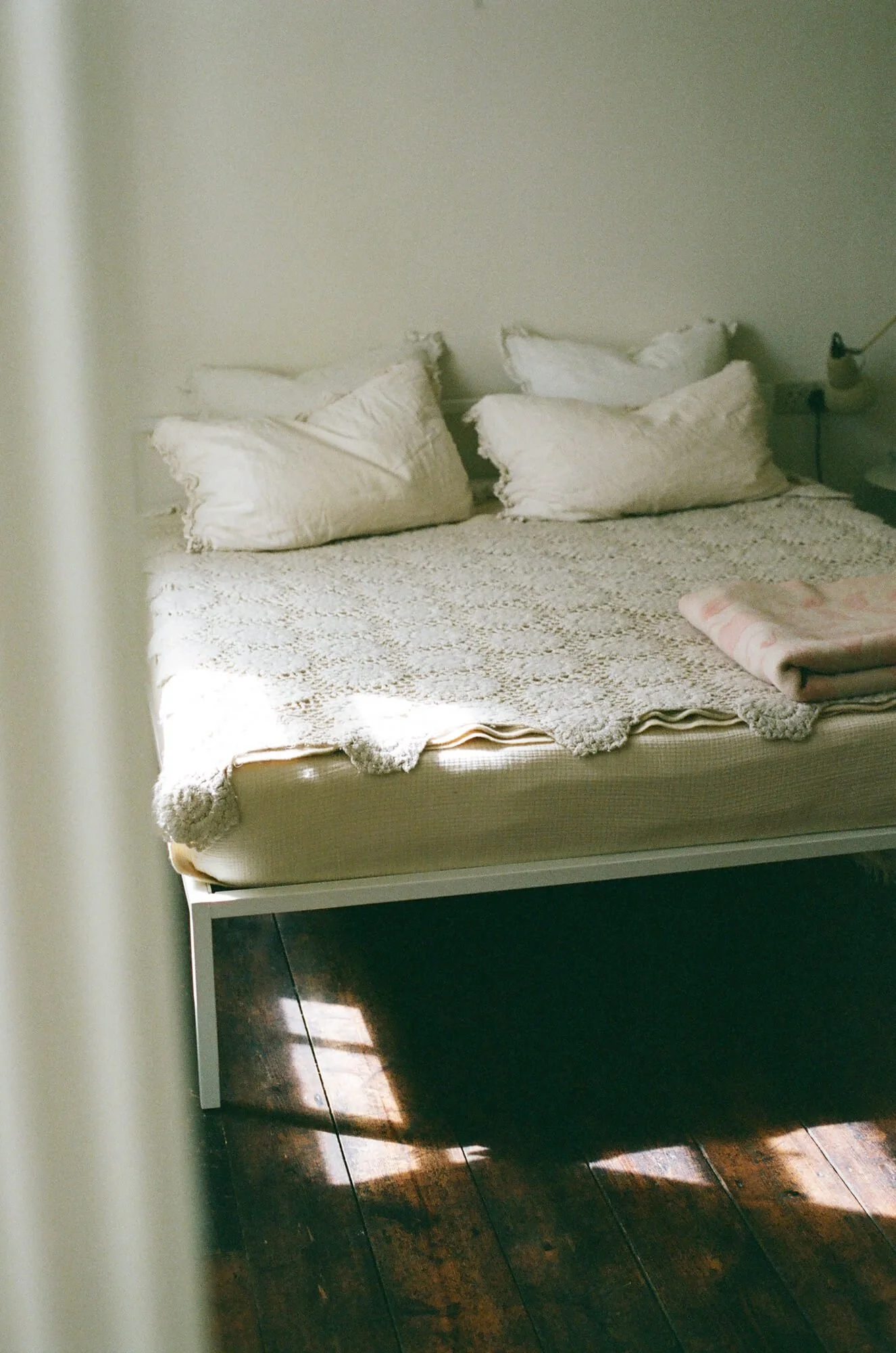 linen-ruffle-pillows-crochet-blanket-caravan-style