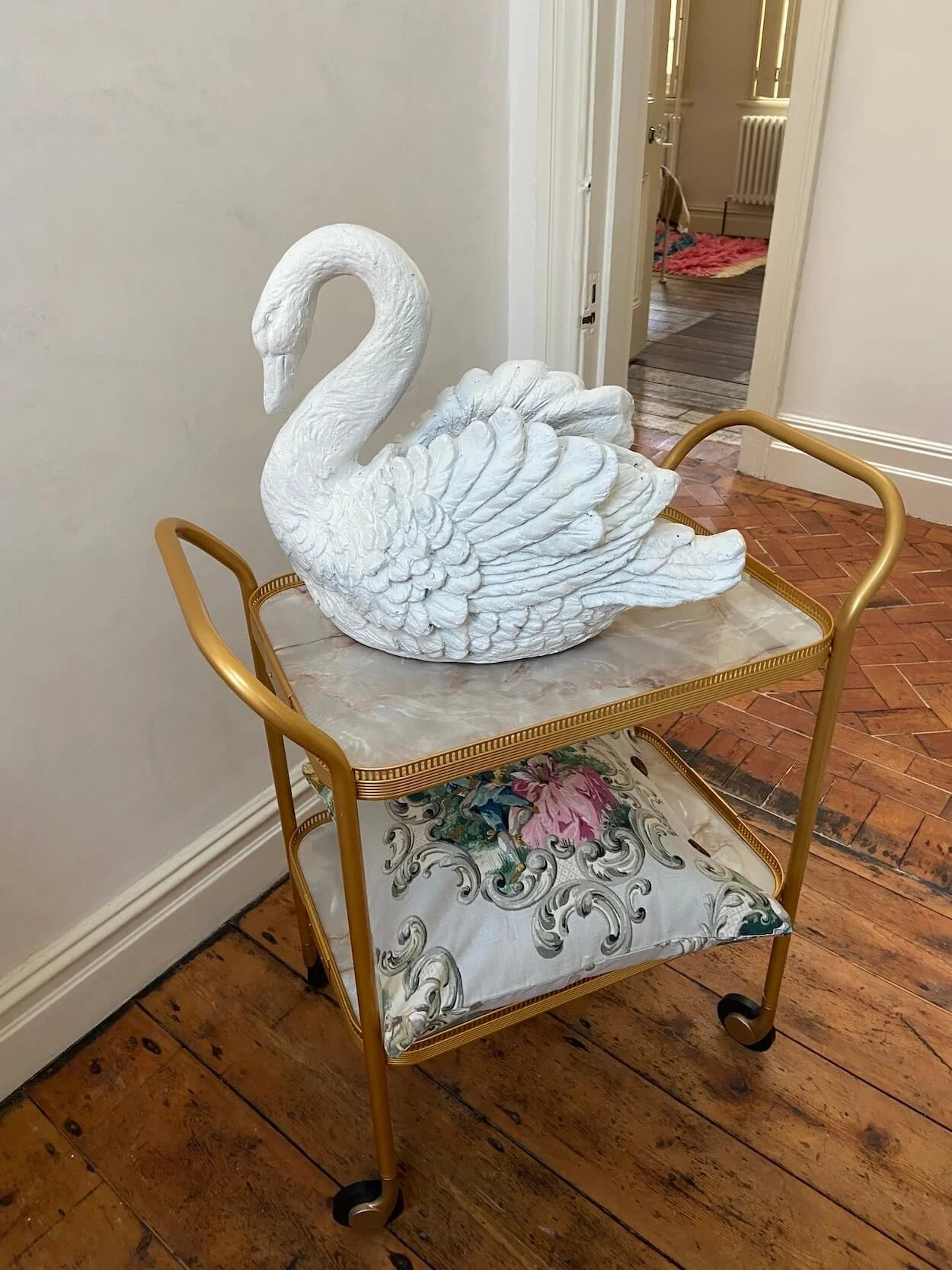 white-swan-on-trolley-caravan-style.jpeg