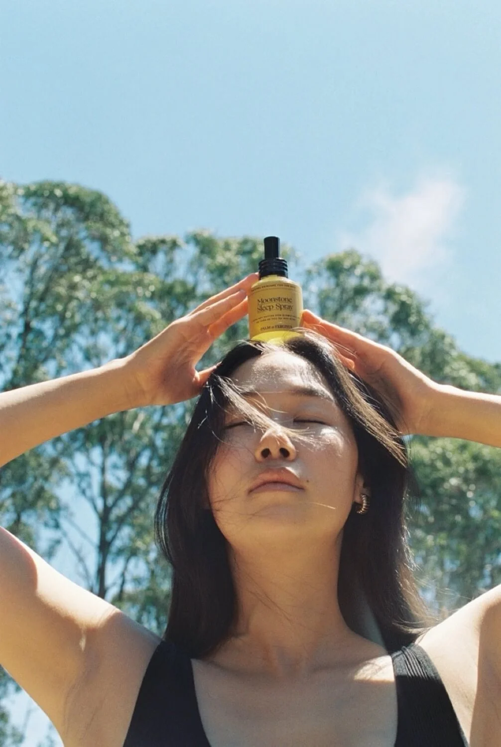 Grounding Bath Elixir by Palm of Feronia held above the head.