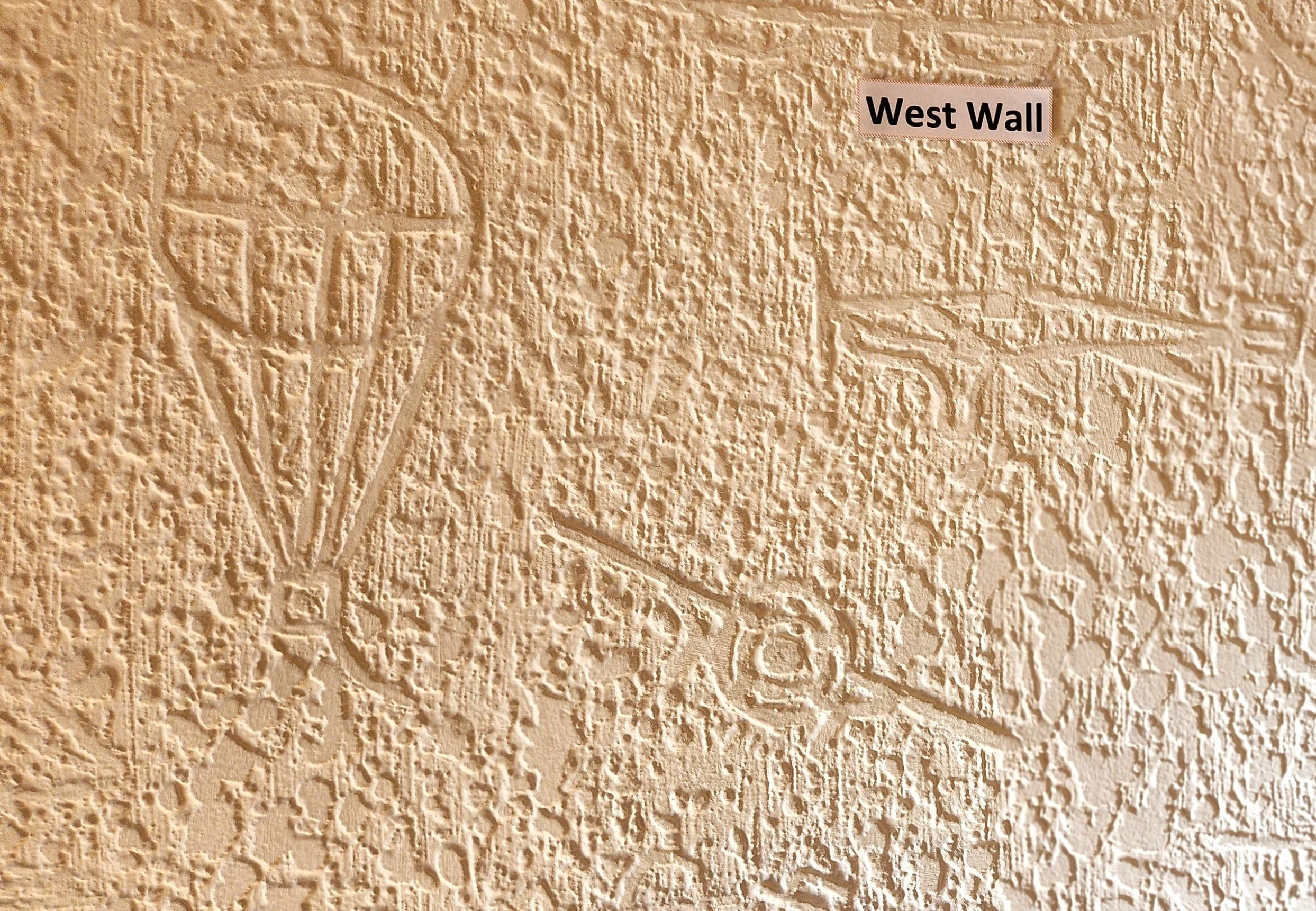 A close up image of images on the West Wall of Nancy's room