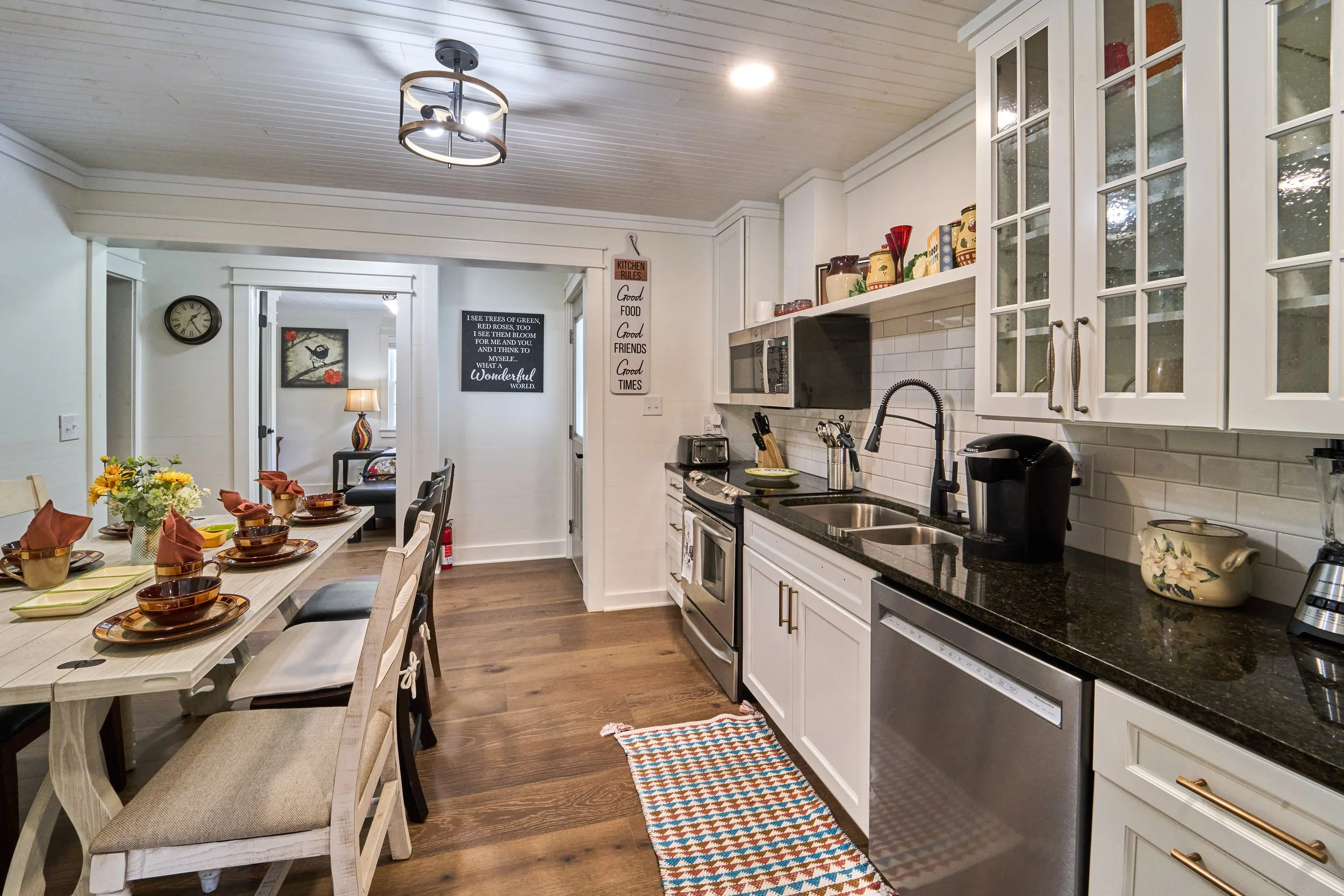 A beautiful kitchen with a farm style table