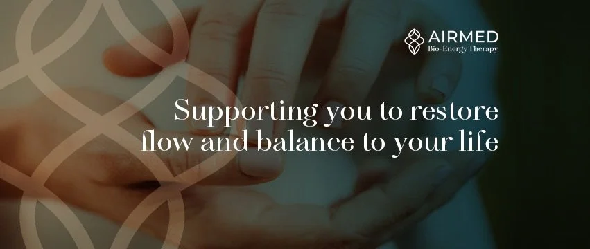 A promotional graphic for AIRMED Bio Energy Therapy featuring a close-up of two hands gently cupping, with overlapping circular patterns and the text 'Supporting you to restore flow and balance to your life'.