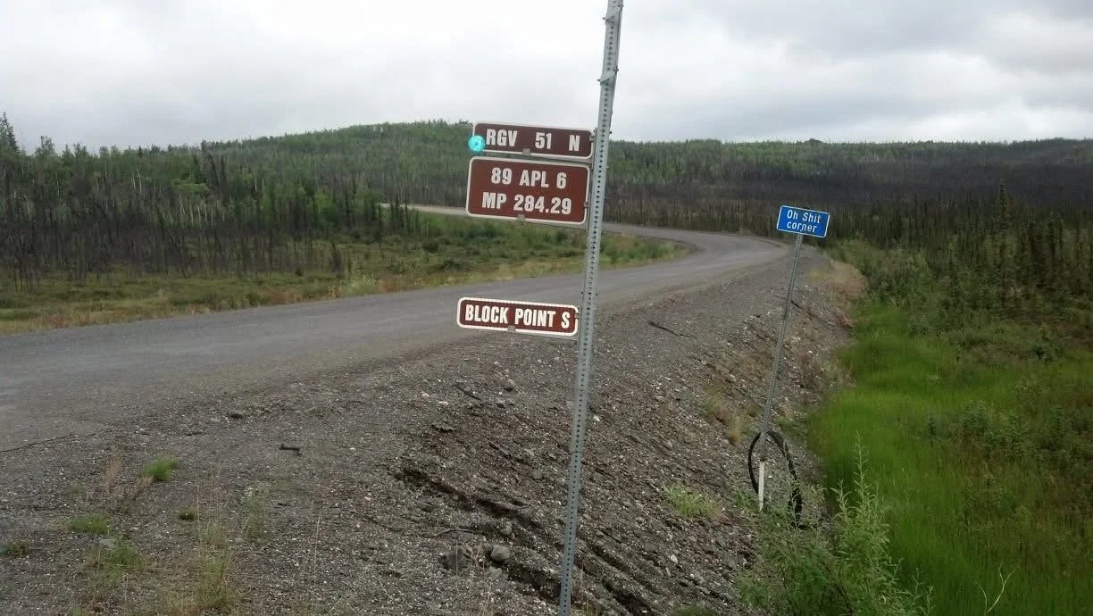 Mileposts, Blue Signs, and the Courage to Name the Curve