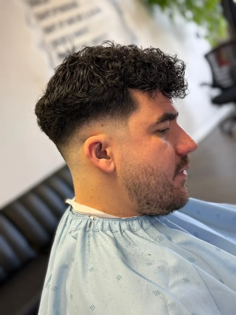 Taper haircut by Elegance Barber Lounge