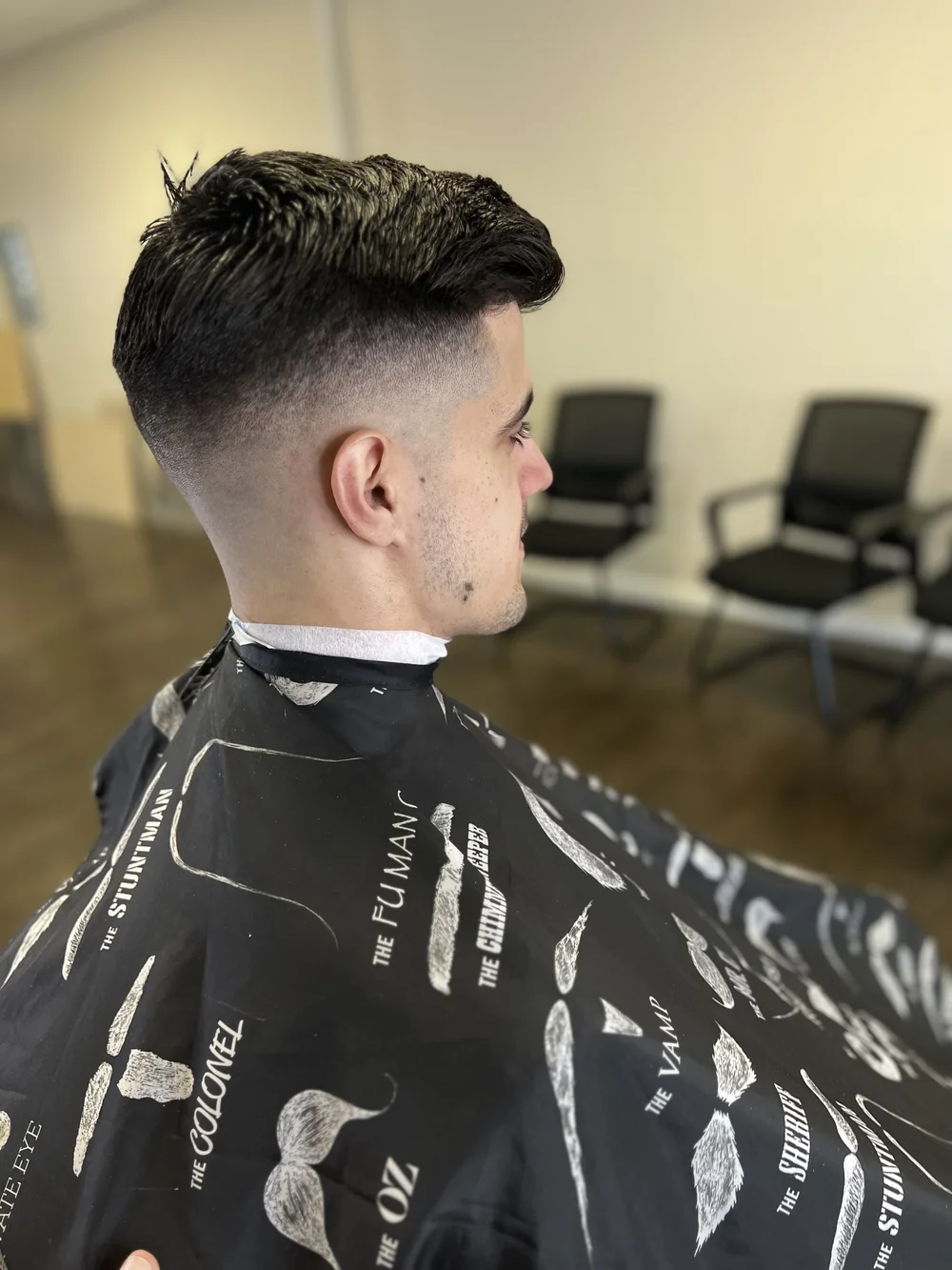 Sharp haircut by Elegance Barber Lounge barbers