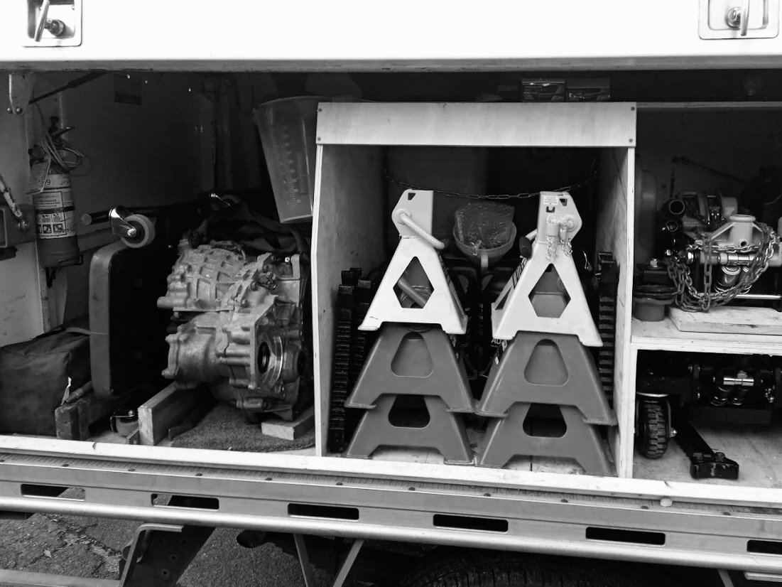 Inside of the Versatile Automotive mobile mechanic truck, complete with a mechanics toolkit and gear.