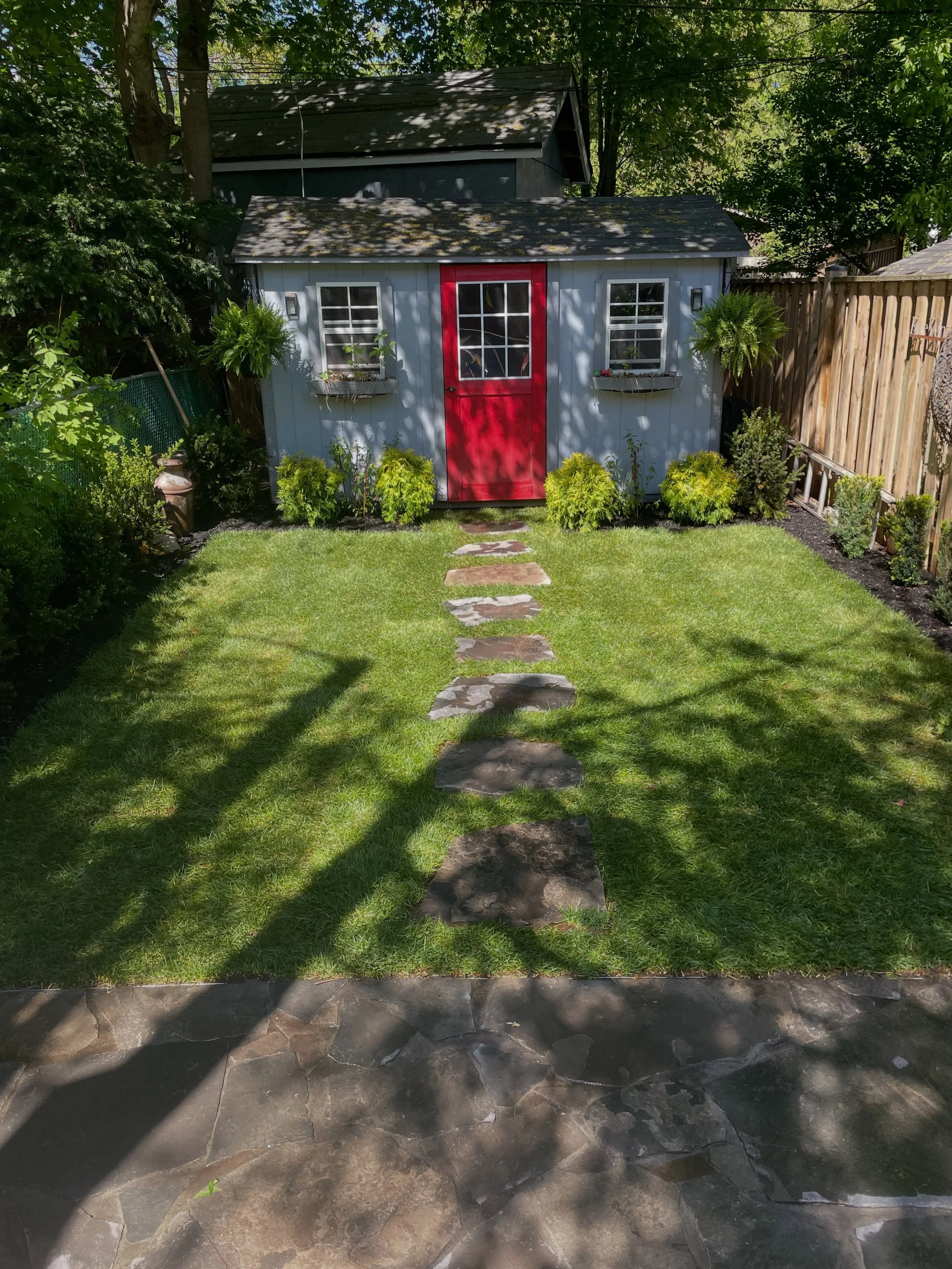 Just posting this old project. 🌱🌳 We love any chance we can install a random flagstone patio. Our team also installed fresh sodding and some brand new plants to add to this cottage feel home in Toronto. 
Thanks to @islingtonnurseriesstoneyard for p