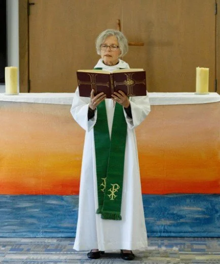 spc2026MaryEricksonreadingGospel.jpg