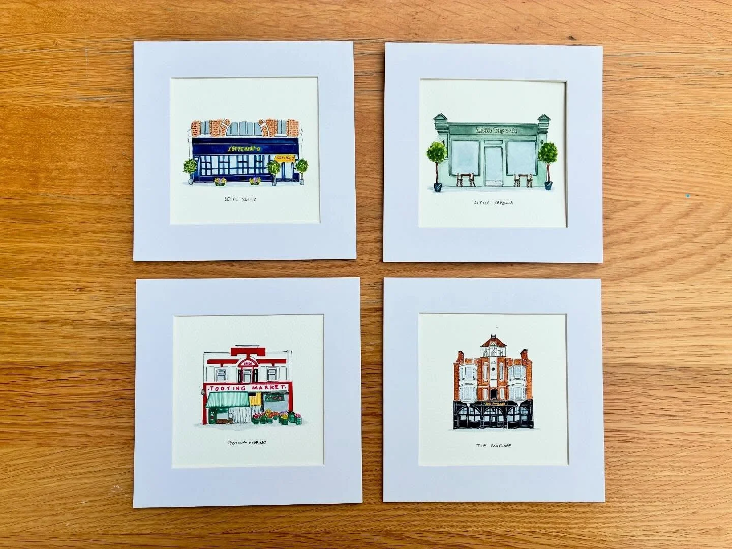A set of four and I am completely obsessed 🖤

A recent commission from a lovely couple in Tooting to illustrate @pizzeriasettebellotooting @littletaperiatooting @tootingmarket @theantelopesw17.

AND they requested black frames. I had no idea they&rs