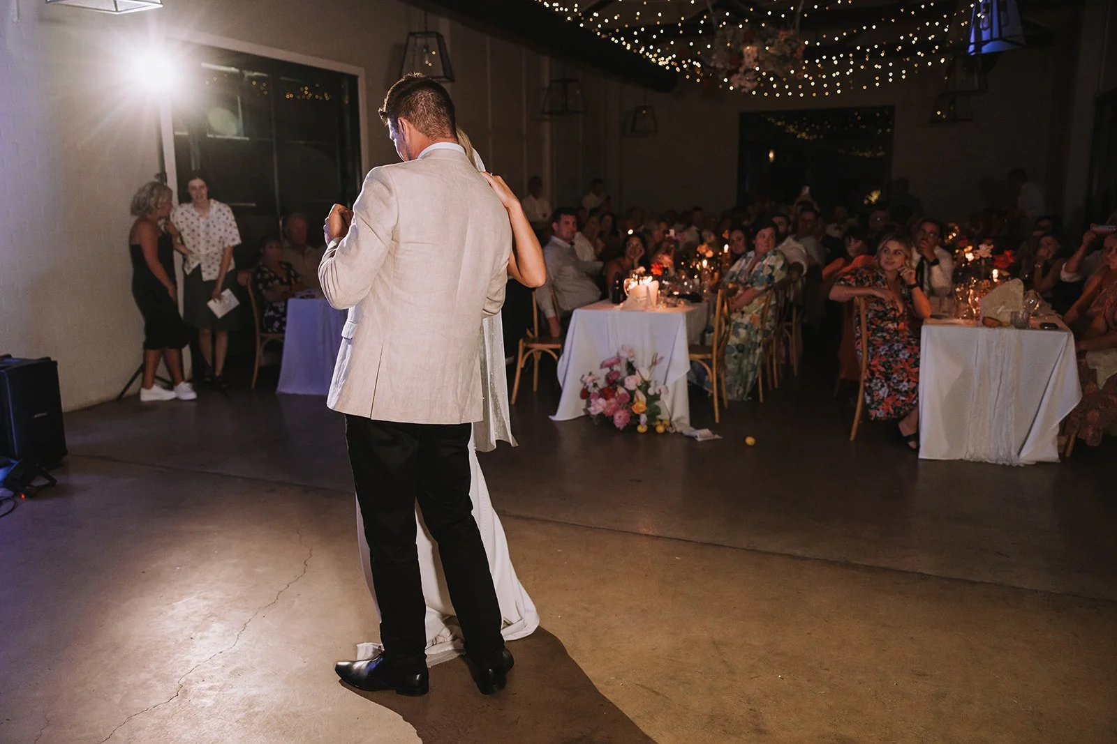 Guests dancing under string lights at wedding Hunter Valley Wedding Photographer NSW - Image 377