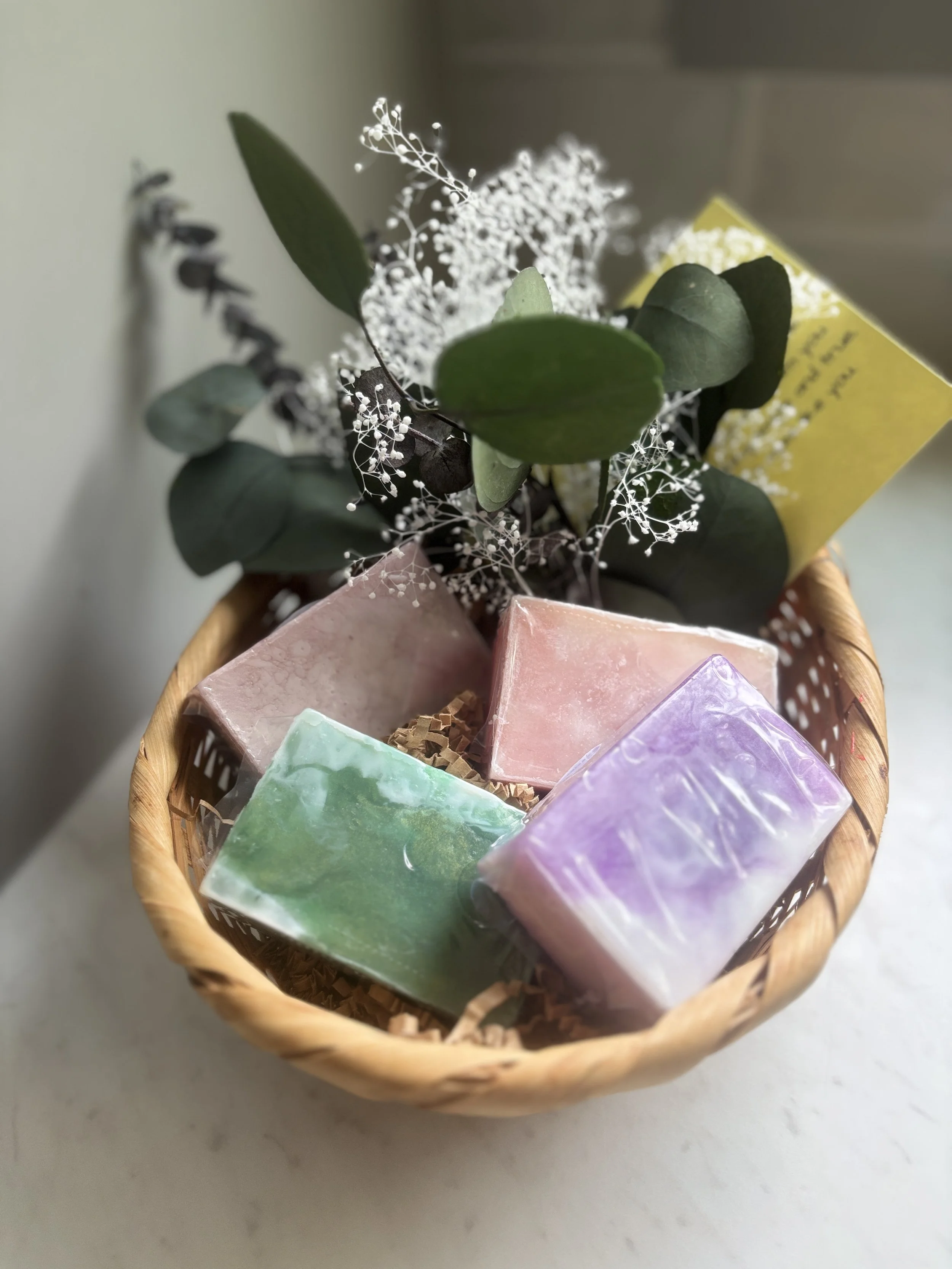 4 soaps in baskets.jpg