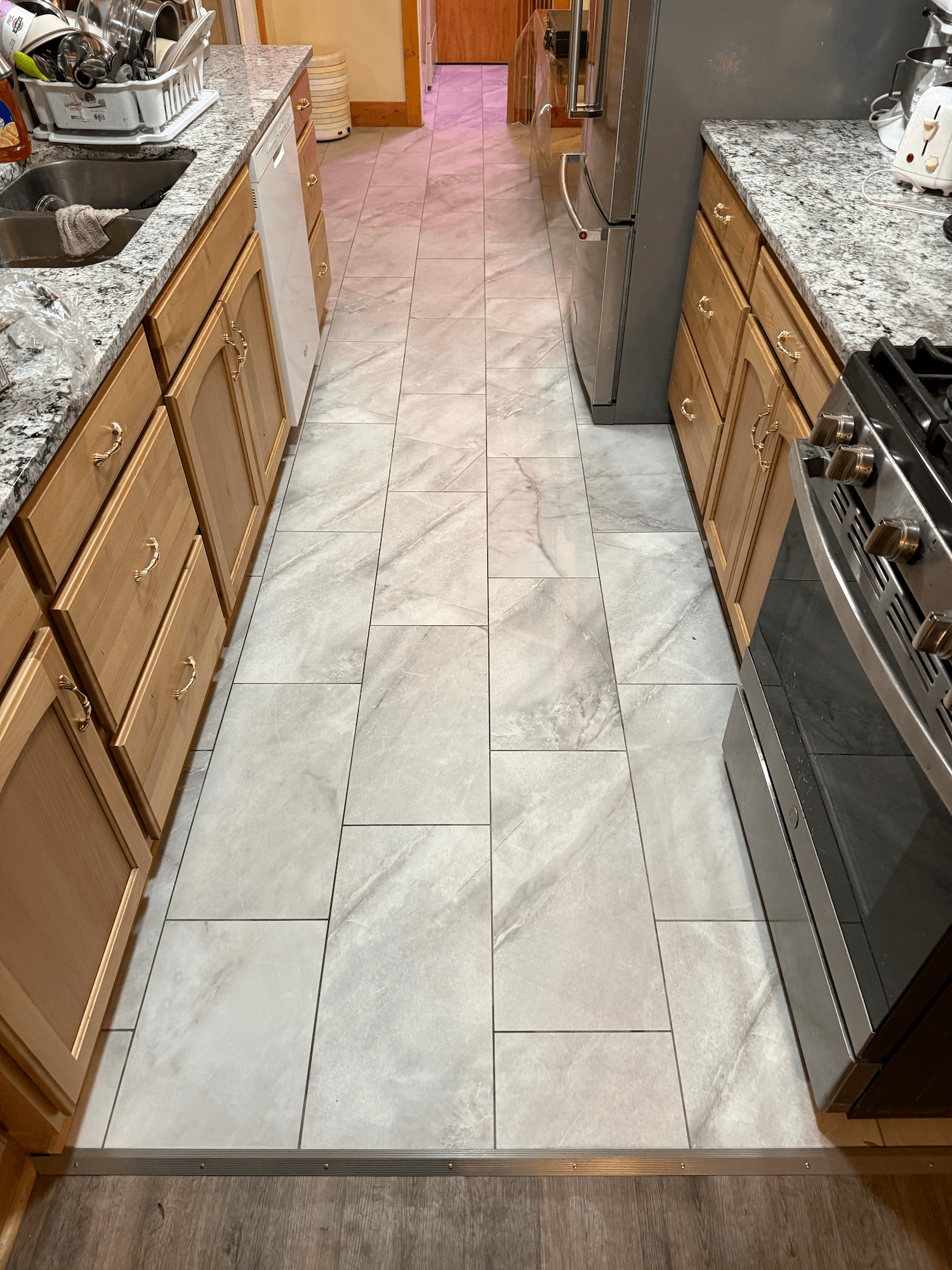 Floor installation in progress in Logan, Utah by ONYX Bros