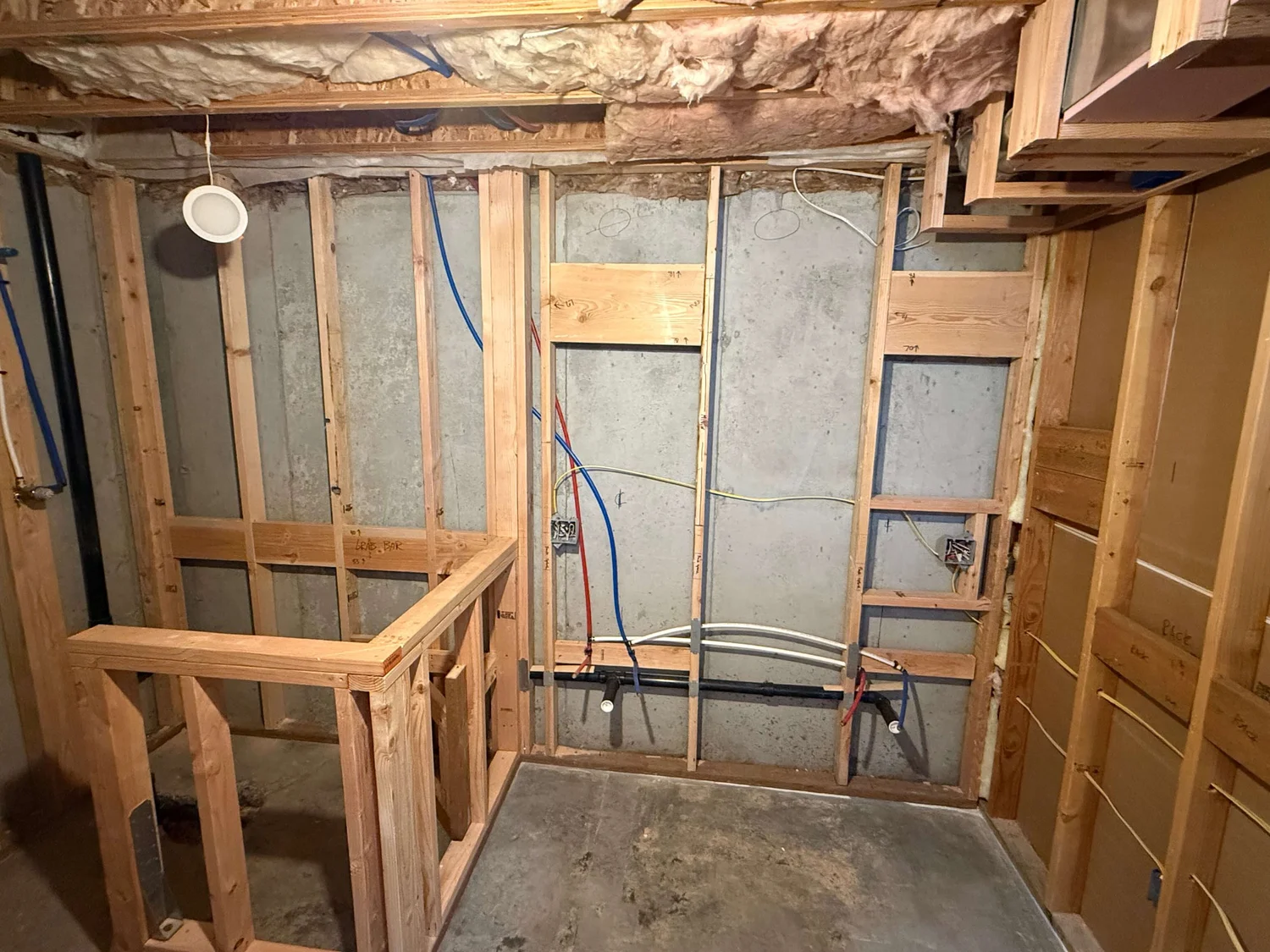 Basement framing in a Logan, Utah home by ONYX Bros