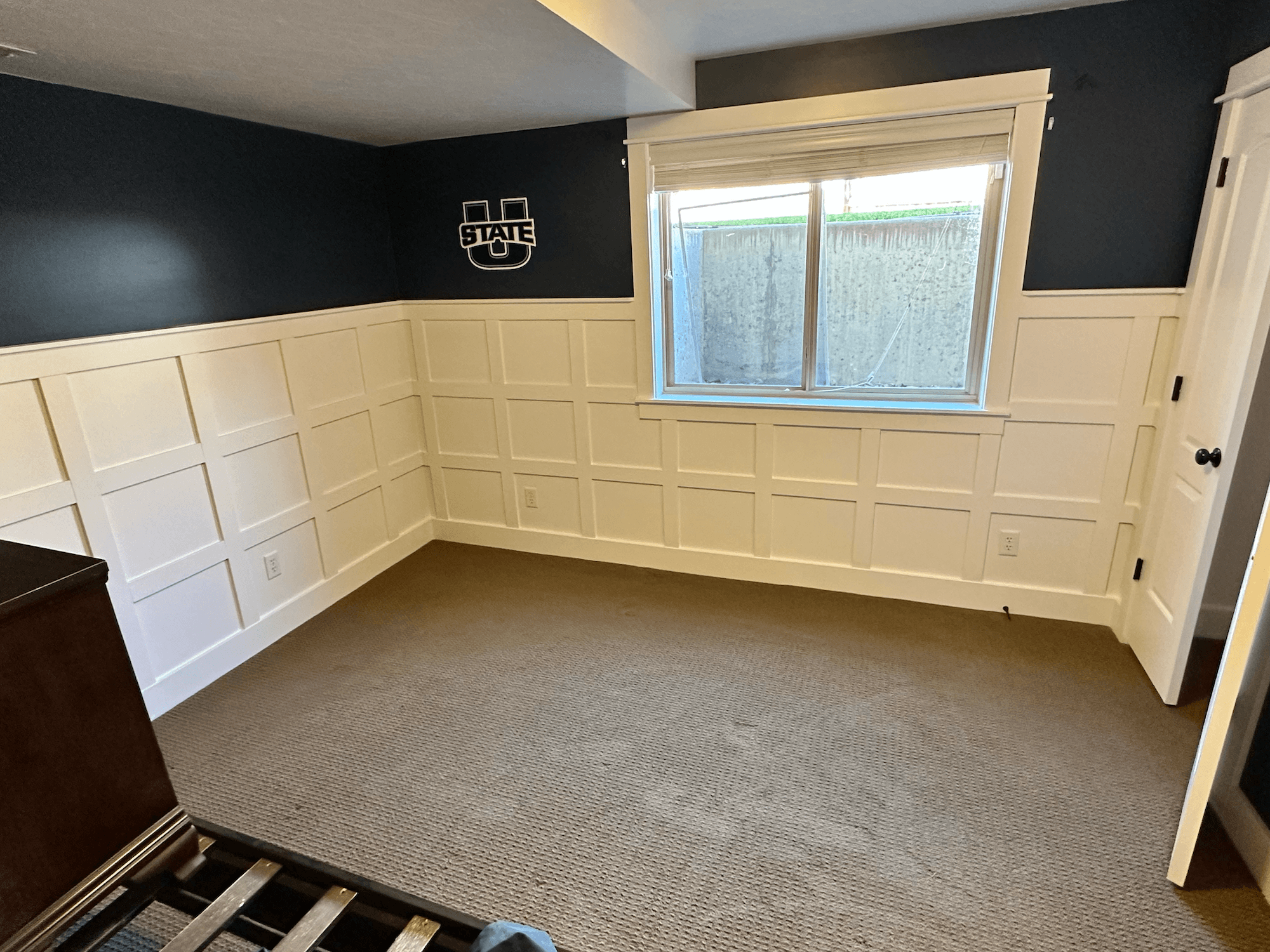 Basement remodel in progress near Logan, Utah, drywall hung with a custom arched doorway by ONYX Bros