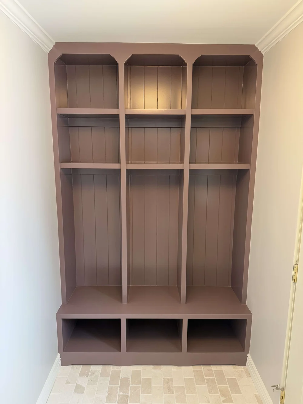 Custom mudroom locker built-in with bench and cubbies in a Cache Valley home