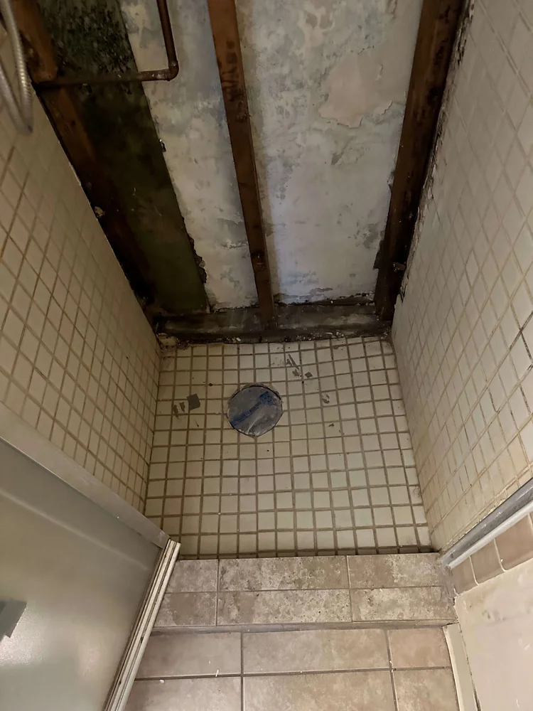 Bathroom ceiling opened up to show moisture damage from poor ventilation in a Cache Valley home