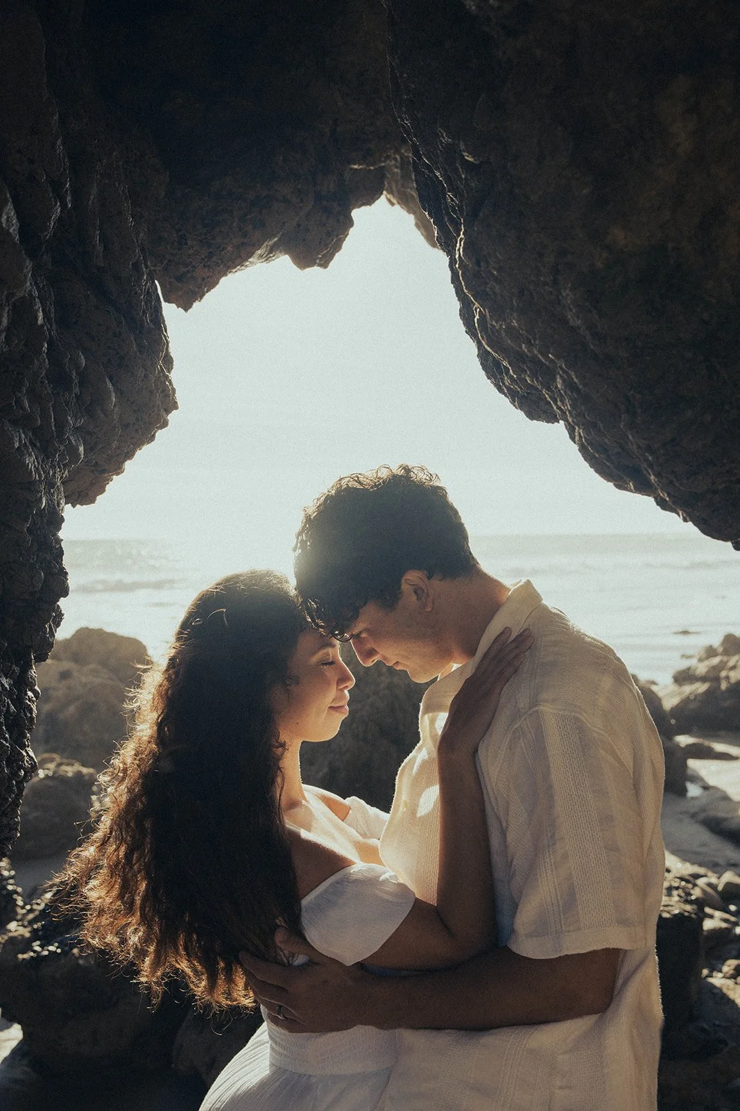 Couple exploring the Washington coast during their PNW engagement session