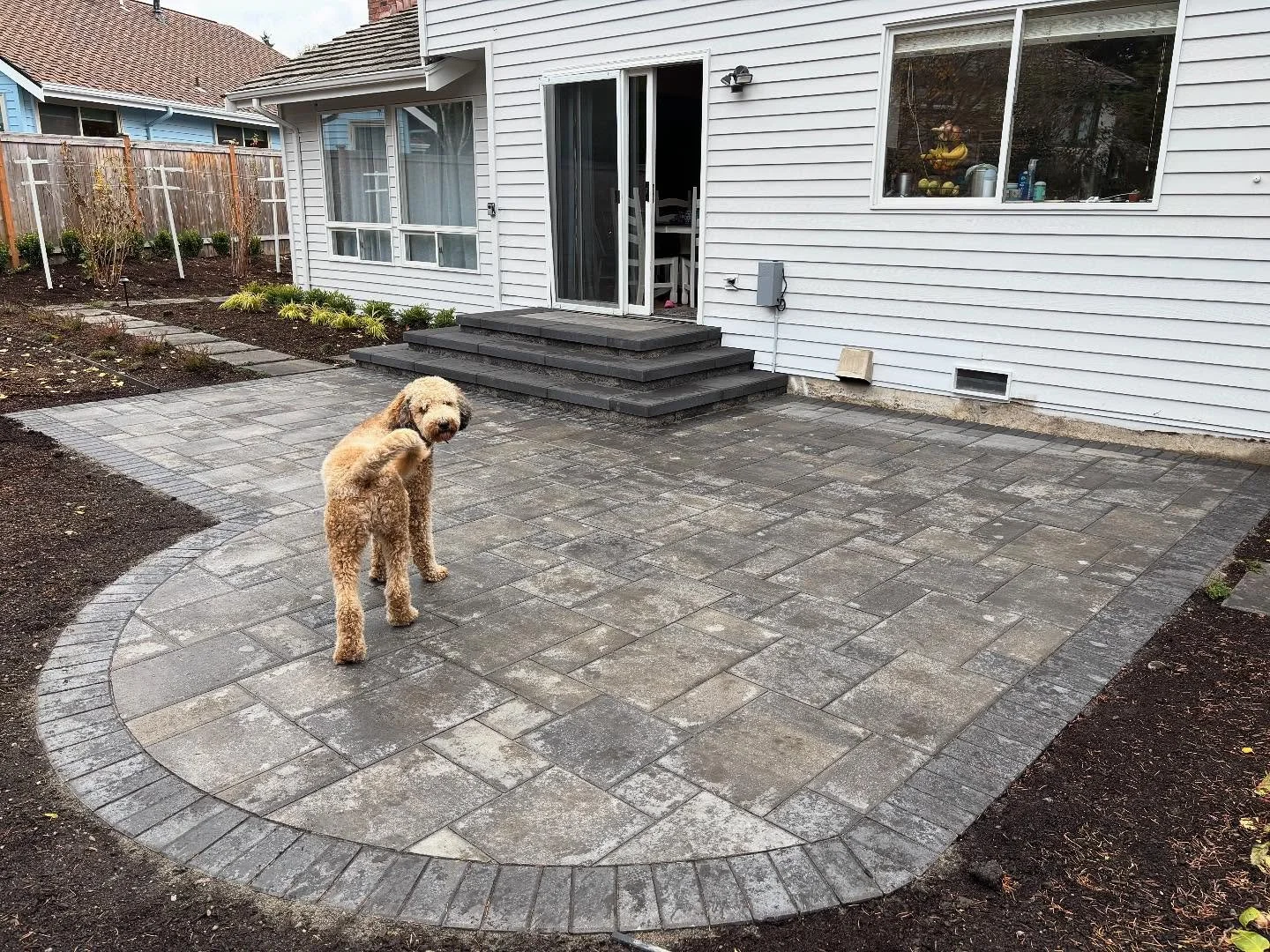 Before and after on a complete backyard renovation in Mukilteo.