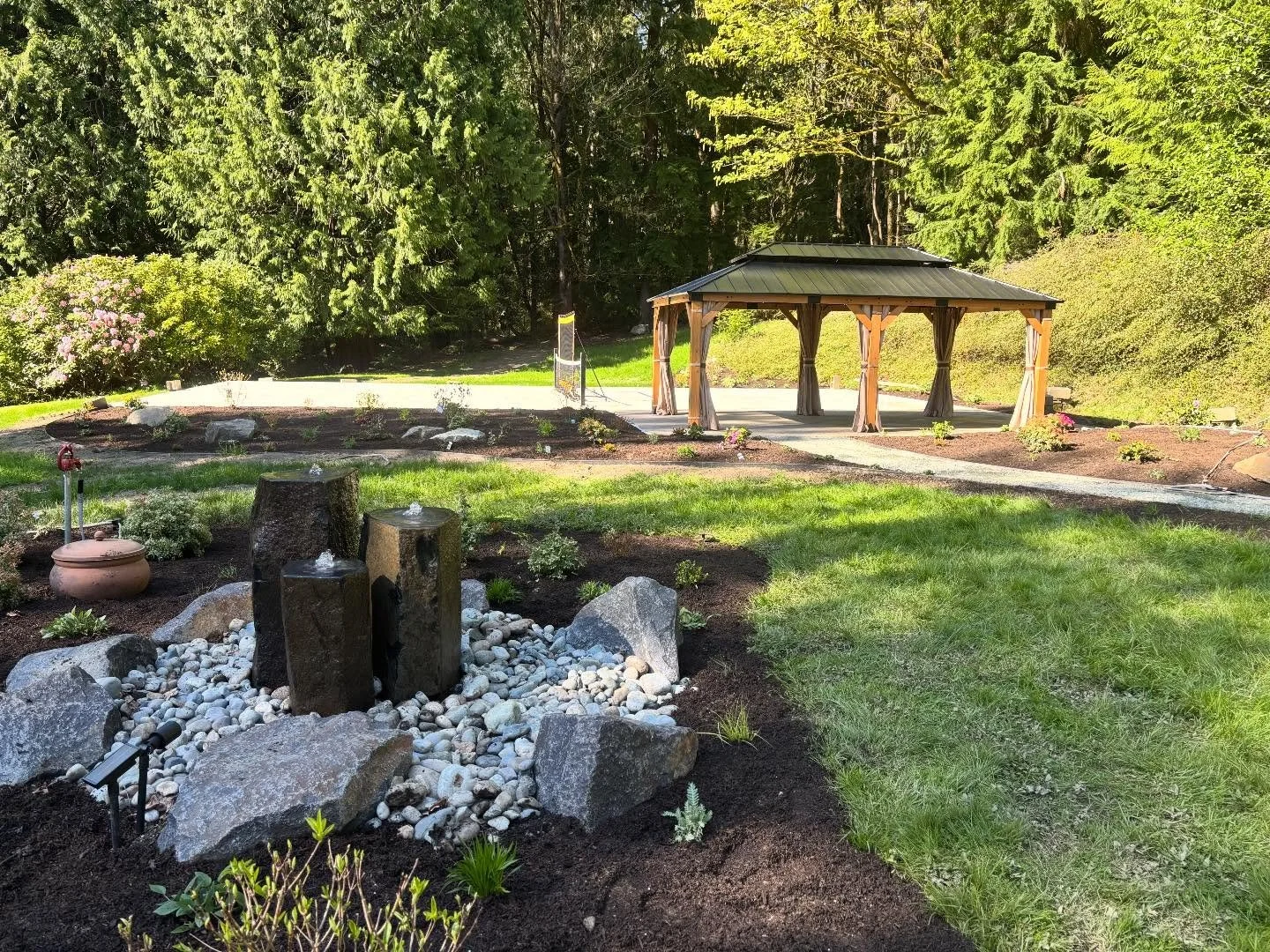 That&rsquo;s a wrap on this ongoing snohomish project . Lots of planting beds, a water feature, deck, patio, gazebo, pathways, and even a pickle ball court ! Very happy with how this turned out !