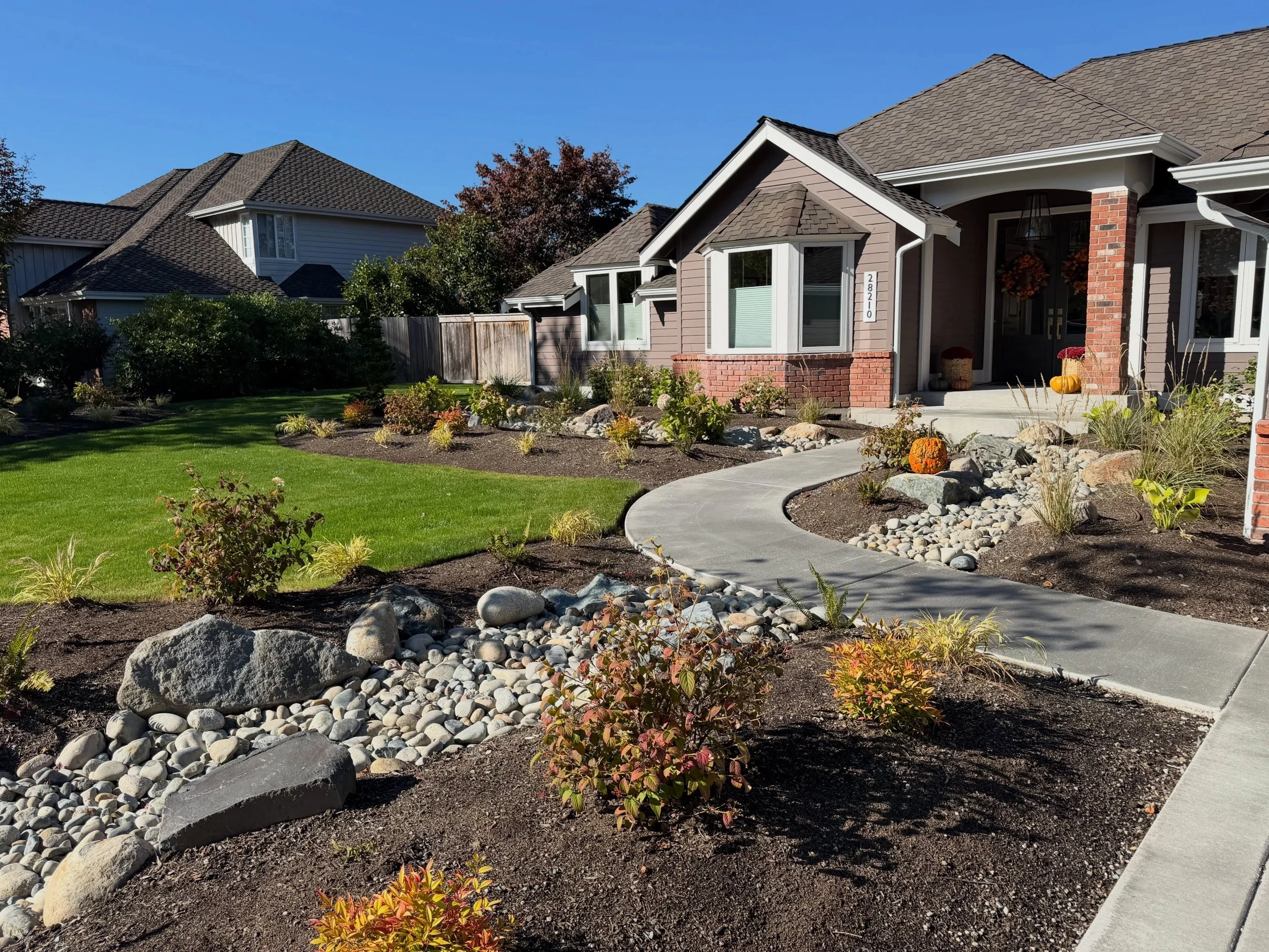 Stopped by a couple past projects we&rsquo;ve completed this year. We love seeing all the plants looking healthy and the lawn looking green!
