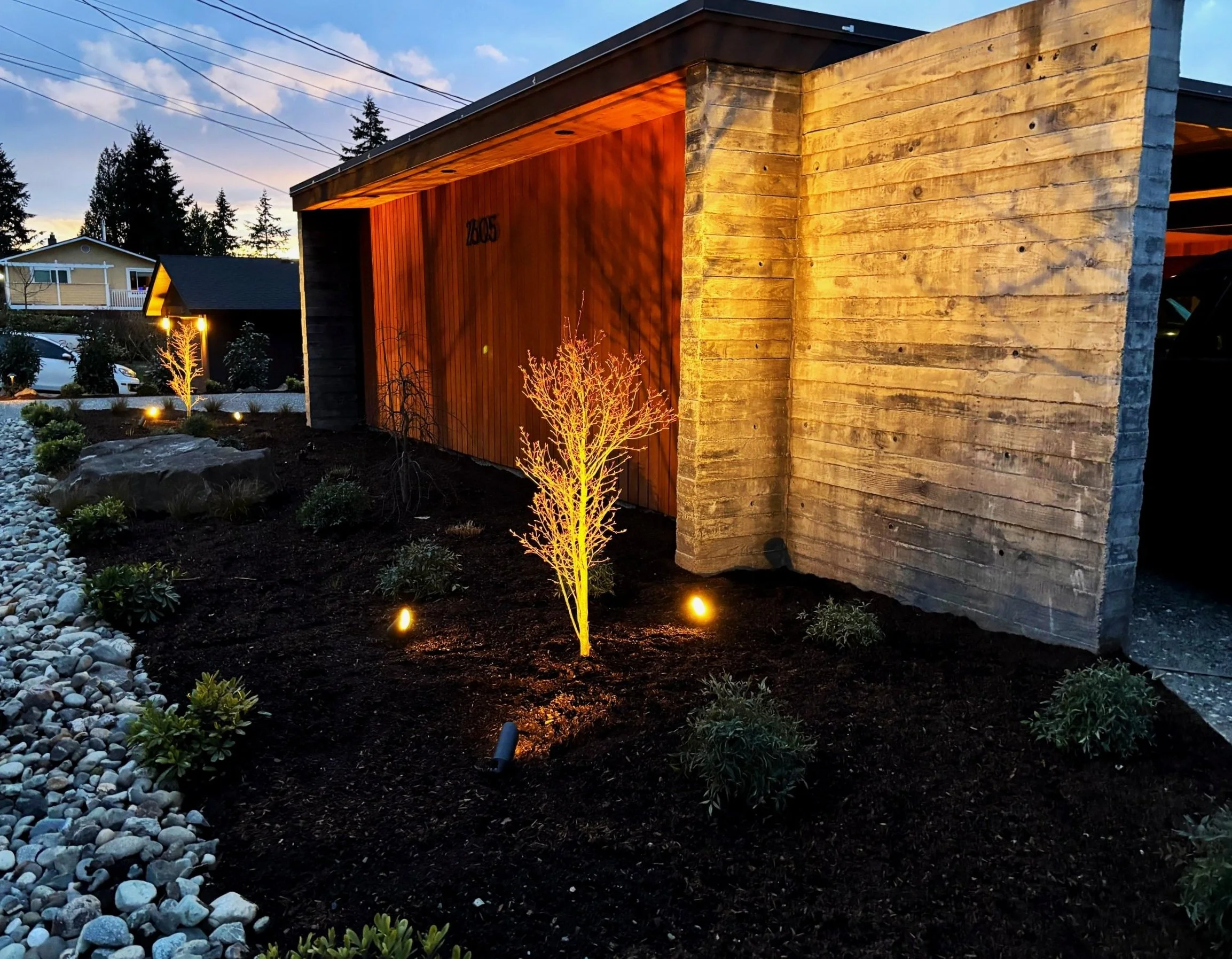 Landscaping with trees, plants and outdoor lighting built by Pacific Pine, the premier landscaper in Snohomish Washington.