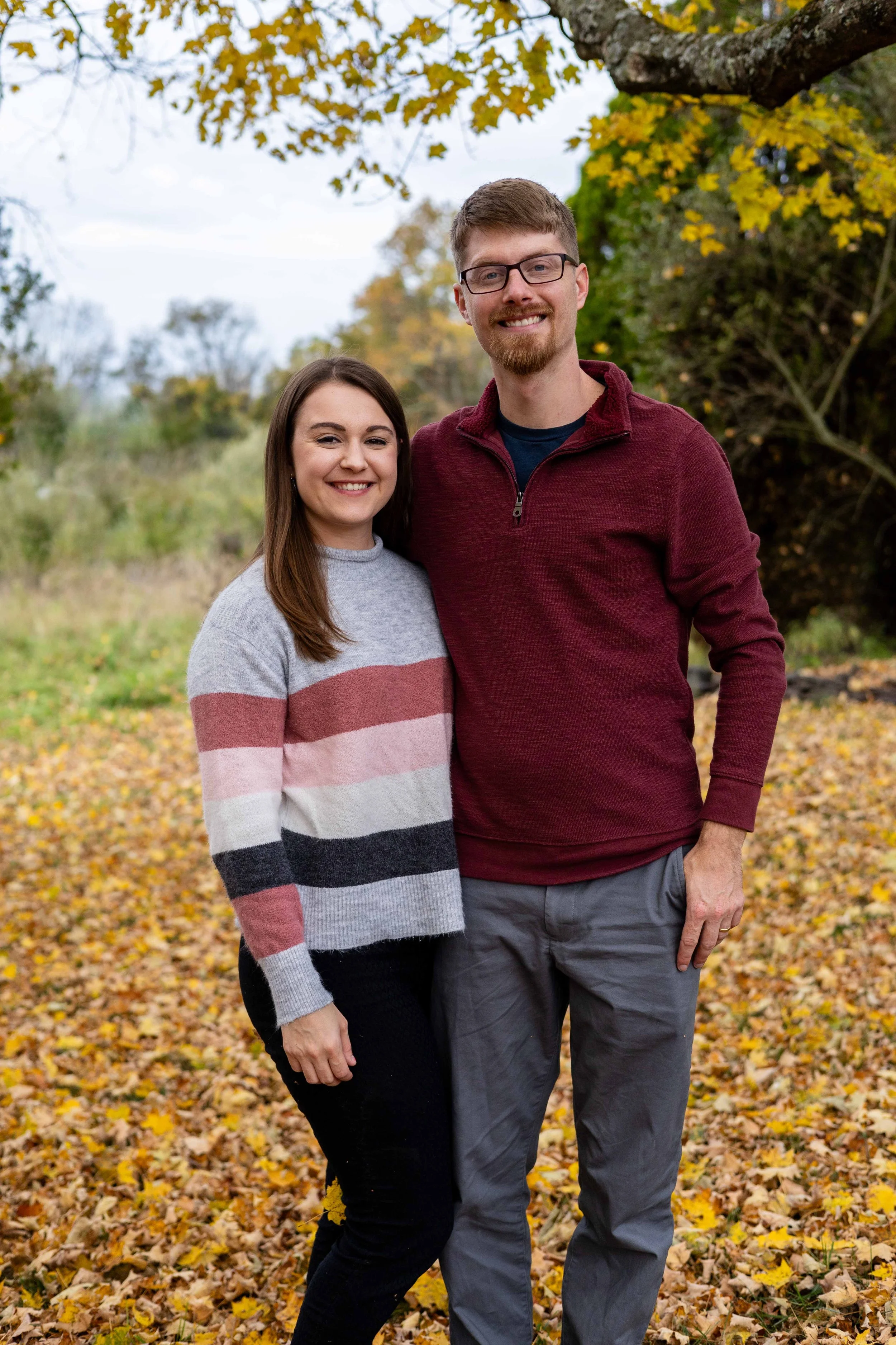 A husband and wife smile and stand together - taken in Hunterdon County, NJ by Jennifer Fulton Photography