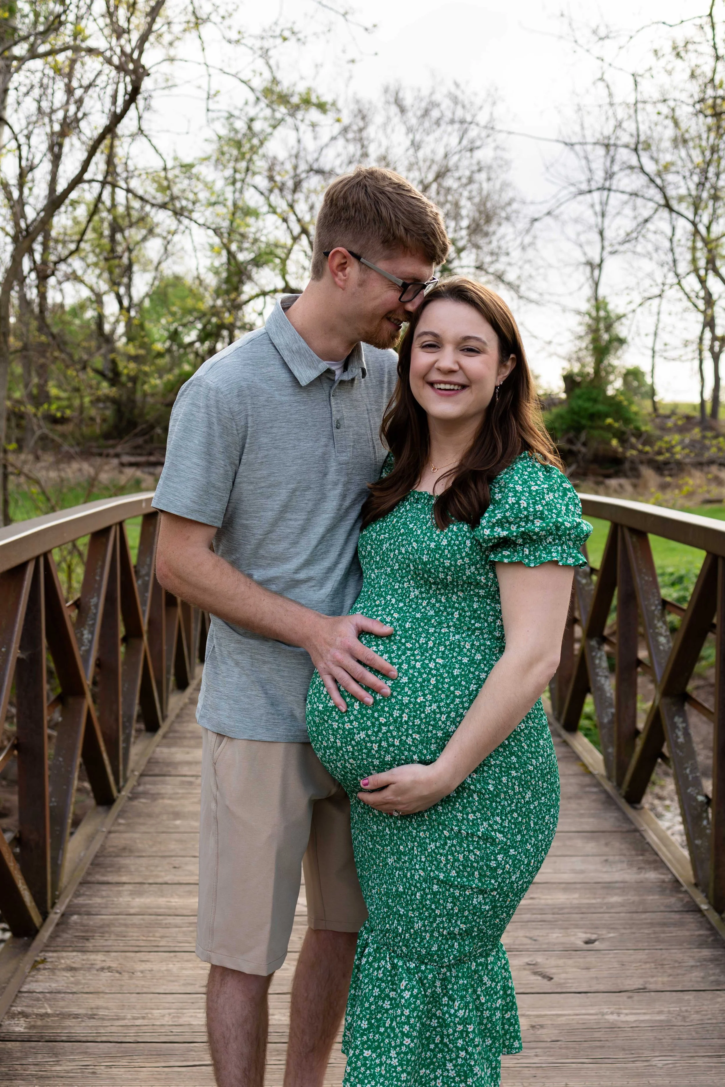 Expecting mom and dad laugh together - maternity portrait taken by Jennifer Fulton Photography in North Jersey