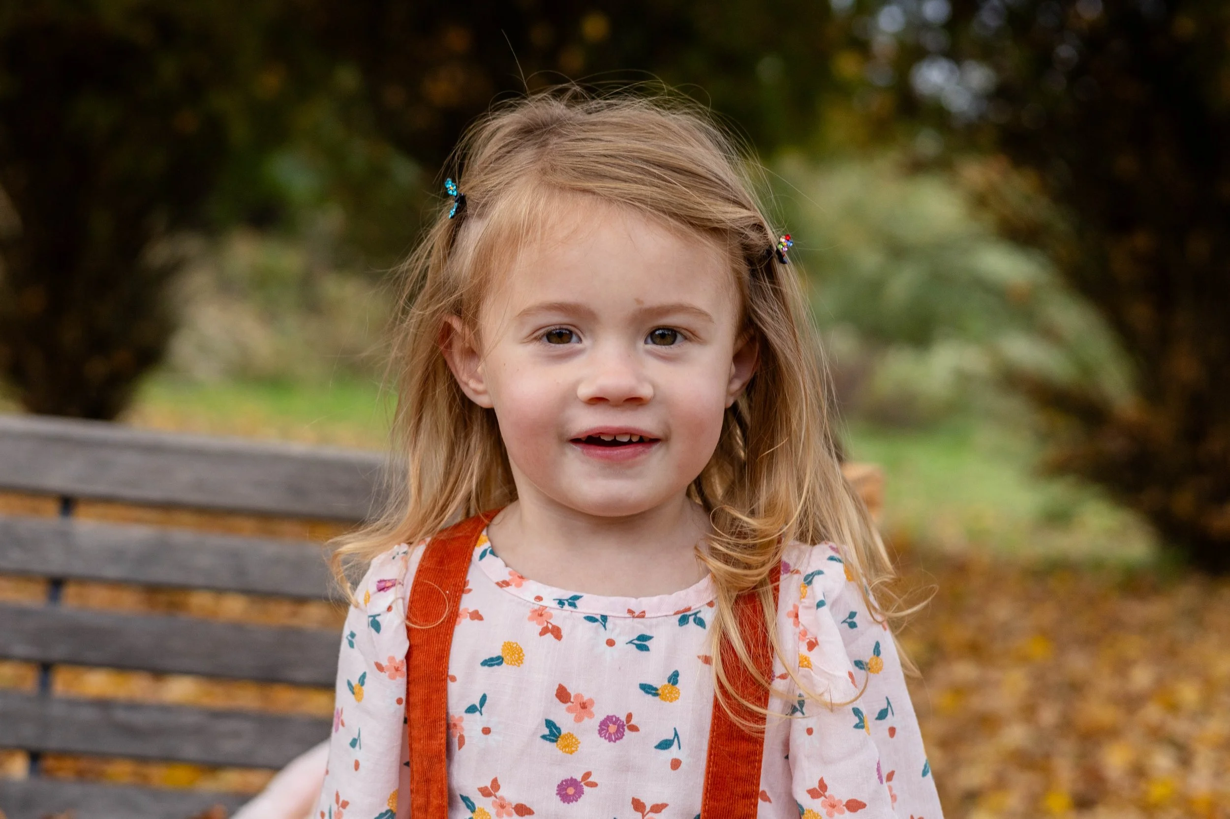 A young girl looks at the camera and smiles - taken in Hunterdon County, NJ by Jennifer Fulton Photography