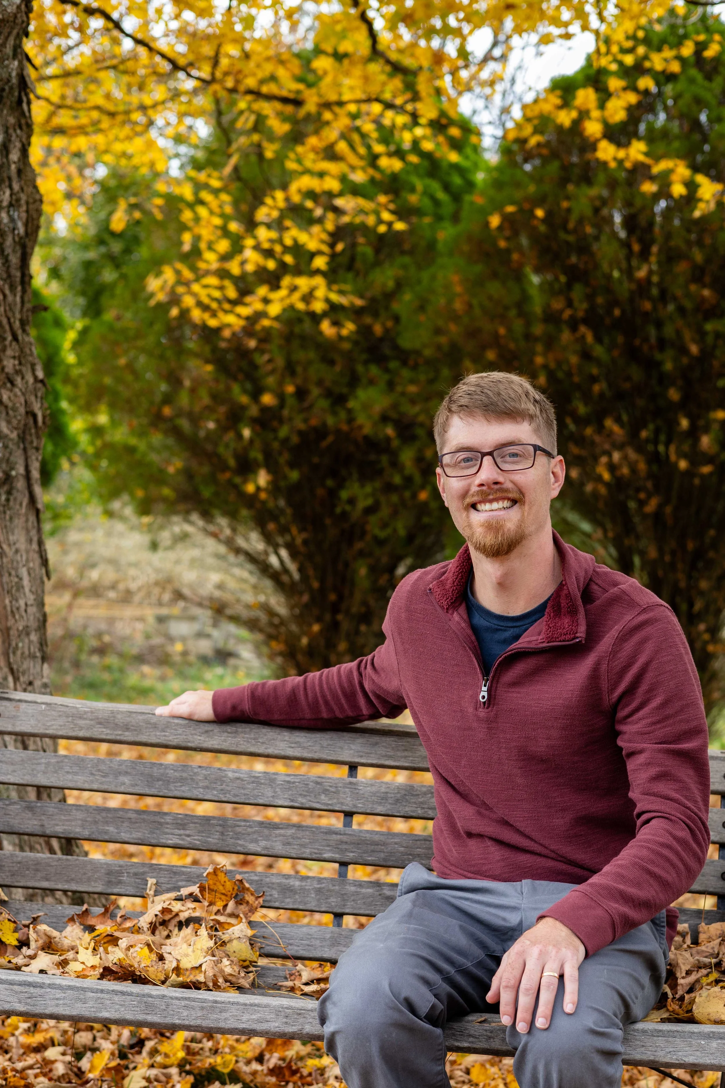 A man sits on a bench in autumn - taken in Hunterdon County, NJ by Jennifer Fulton Photography