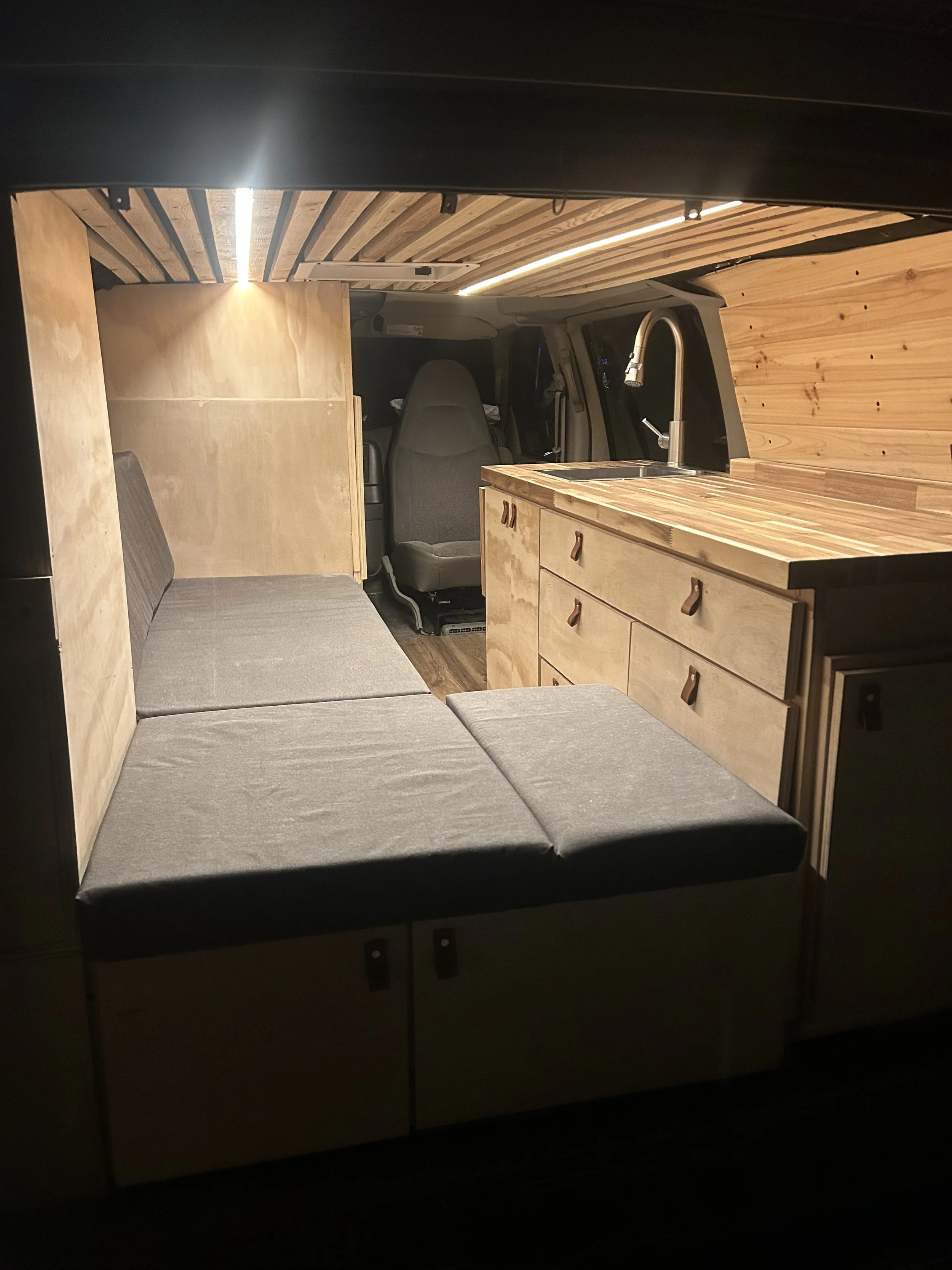 A full build in a Chevy Astro with all the amenities!
