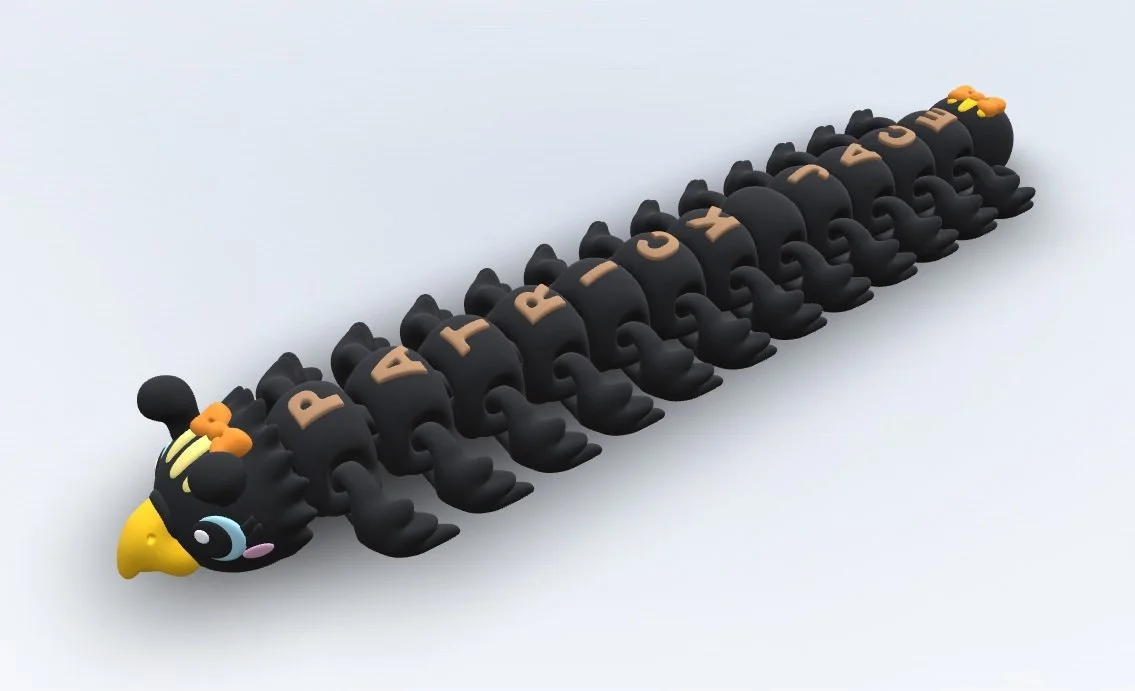 A black caterpillar toy with a yellow nose and colorful facial features, labeled with the letters spelling 'PARTY TIME'.